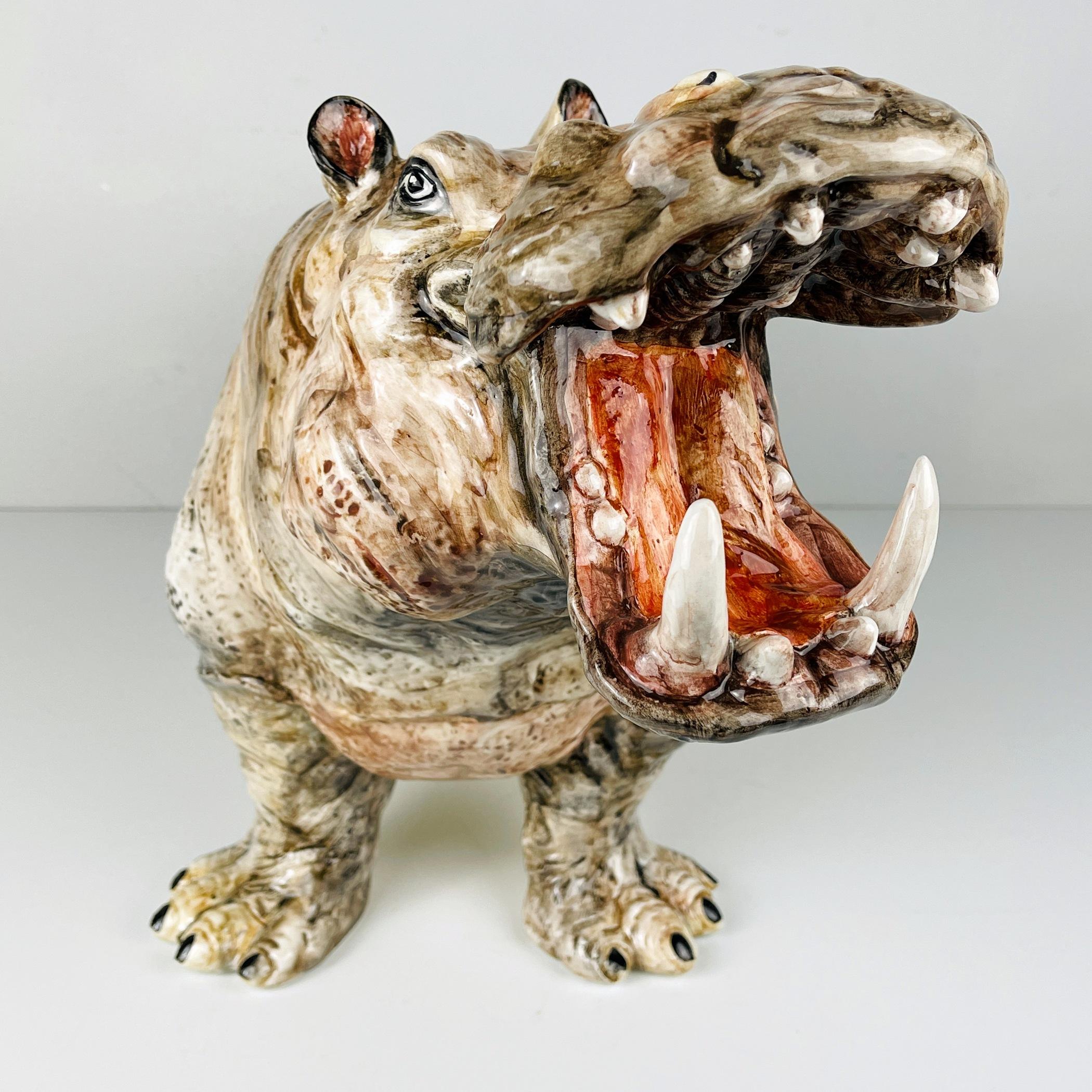 The stunning large hand painted ceramic animal sculpture of hippo made in Bassano Italy in the 1980s.
A very rare sculpture. In great condition.
The perfect addition to any surface and certainly to any home or even office that instantly enhances