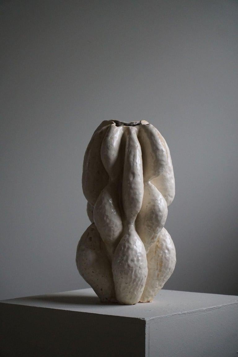 Large ceramic floor vase with glaze in variations of beige colors, made by Danish artist Ole Victor, 2022.

Ole Victor is a Danish artist who attended Art Academy between 1975 and 1980. He creates artworks and ceramics ever since. Hes been exhibited