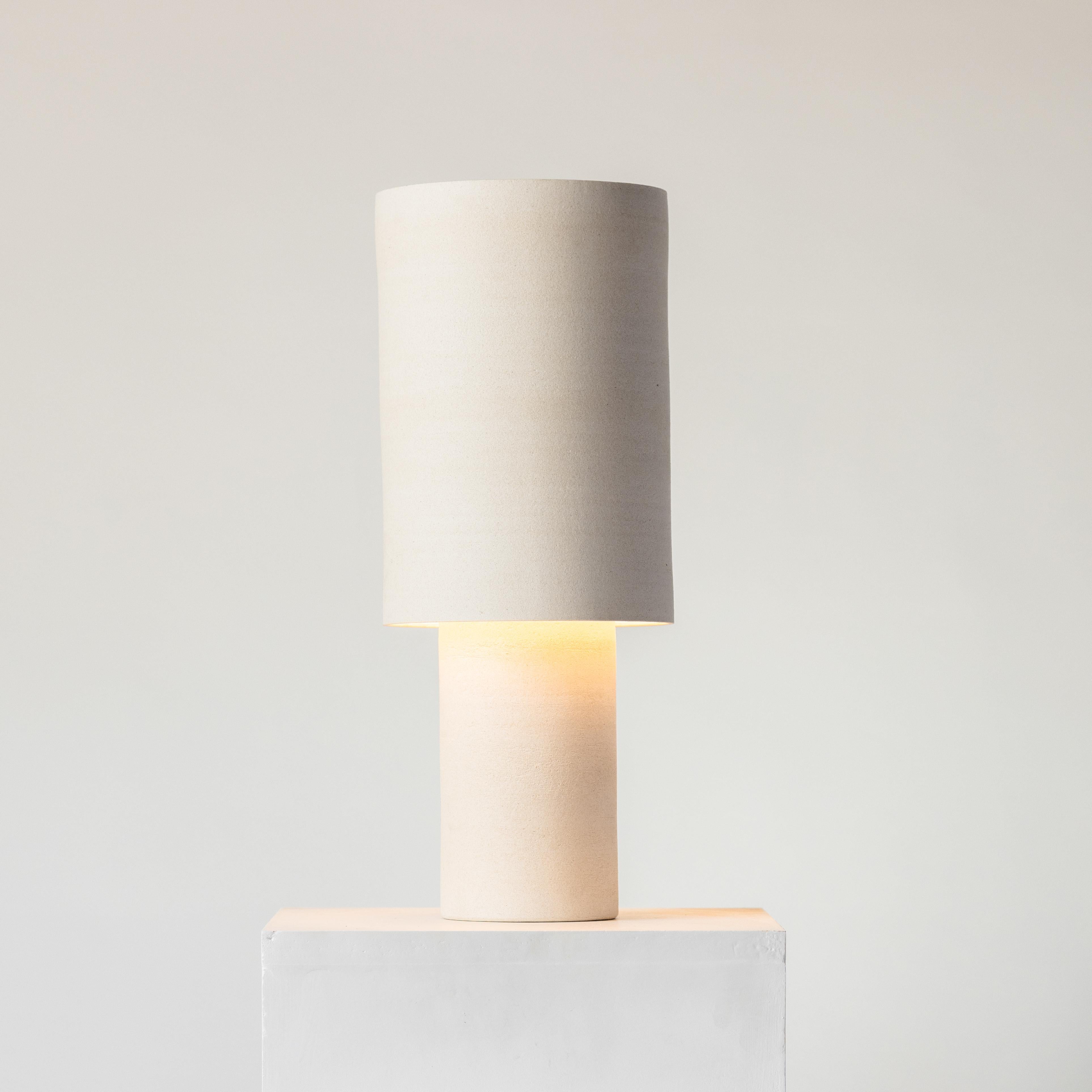 It starts off with 3kg of clay for both the top and bottom of the lamp. Thrown on the potters wheel they are left to dry overnight and trimmed, smoothed and fitted together the next day. It's during this process that the fit is adjusted and the