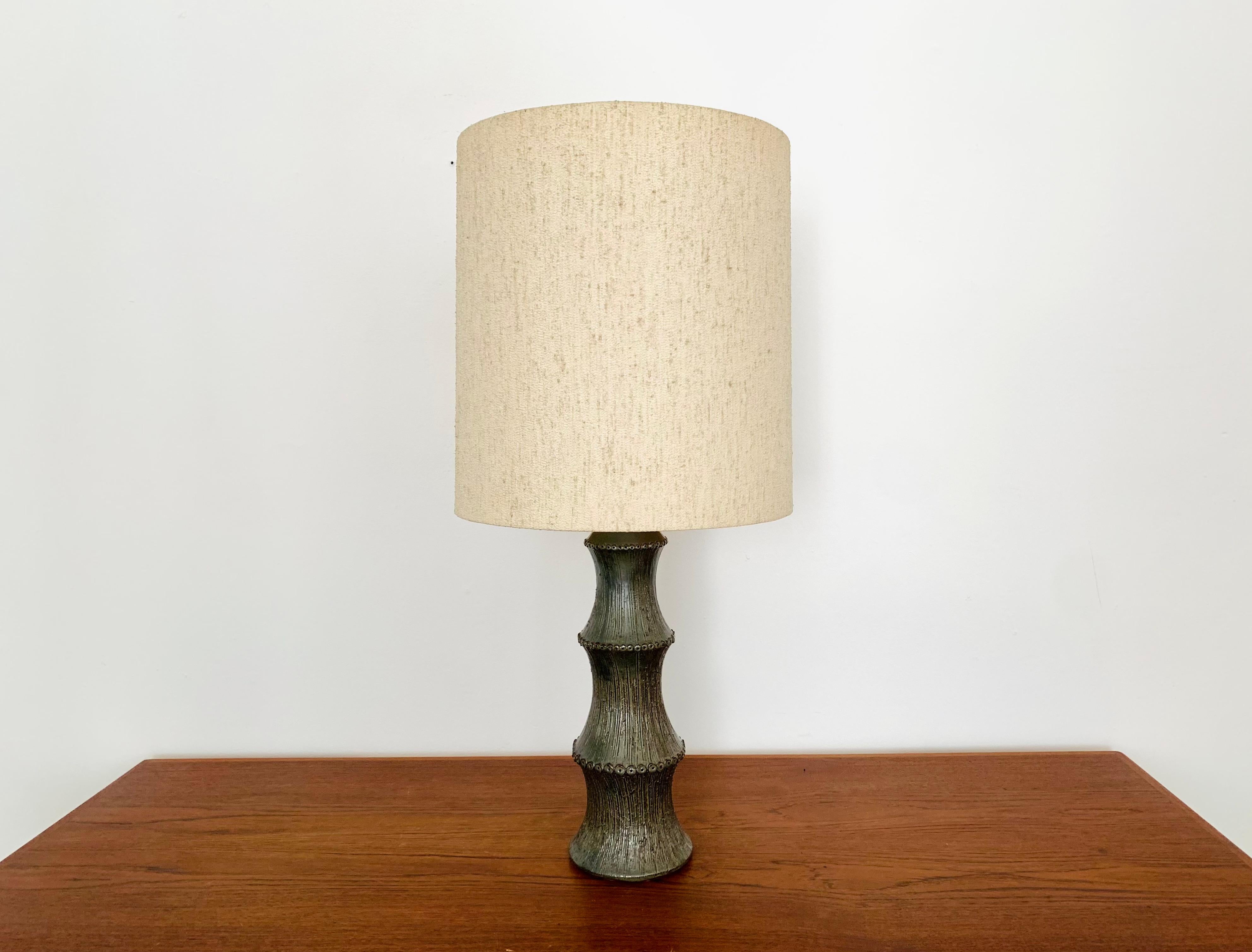 Beautiful table lamp from the 1960s.
The lamp has a great structure and is wonderfully designed.
Very high quality workmanship and fantastic design.

Condition:

Very good vintage condition with the most minimal age -related signs of wear.

The