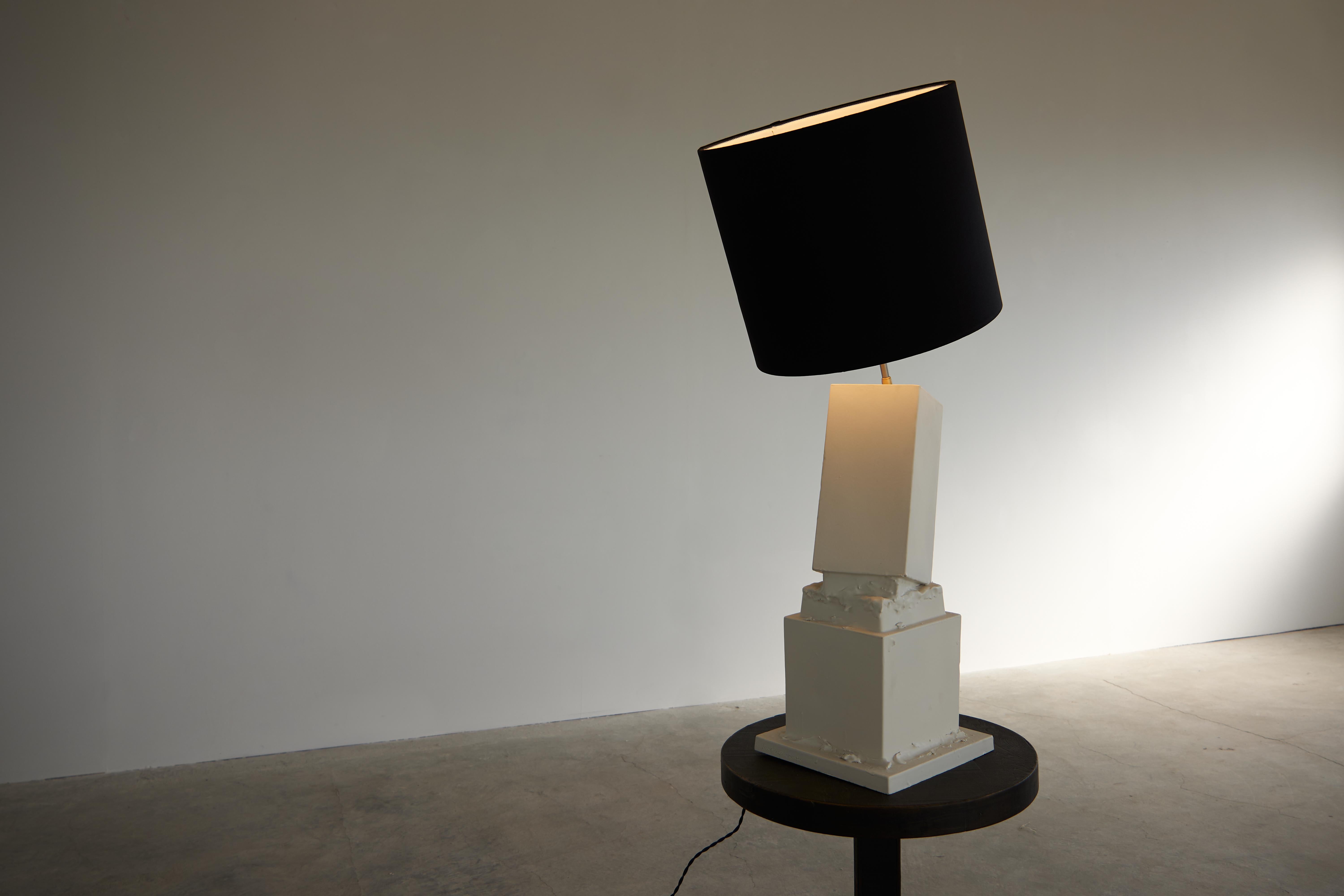 The Marostica+Brenta lamp in dark blue -- different lampshades are available. All lampshades are adjustable on site. 

Part of a project entitled Break the Mold by artist Jenna Basso Pietrobon. Each lamp is unique and the lampshade direction is
