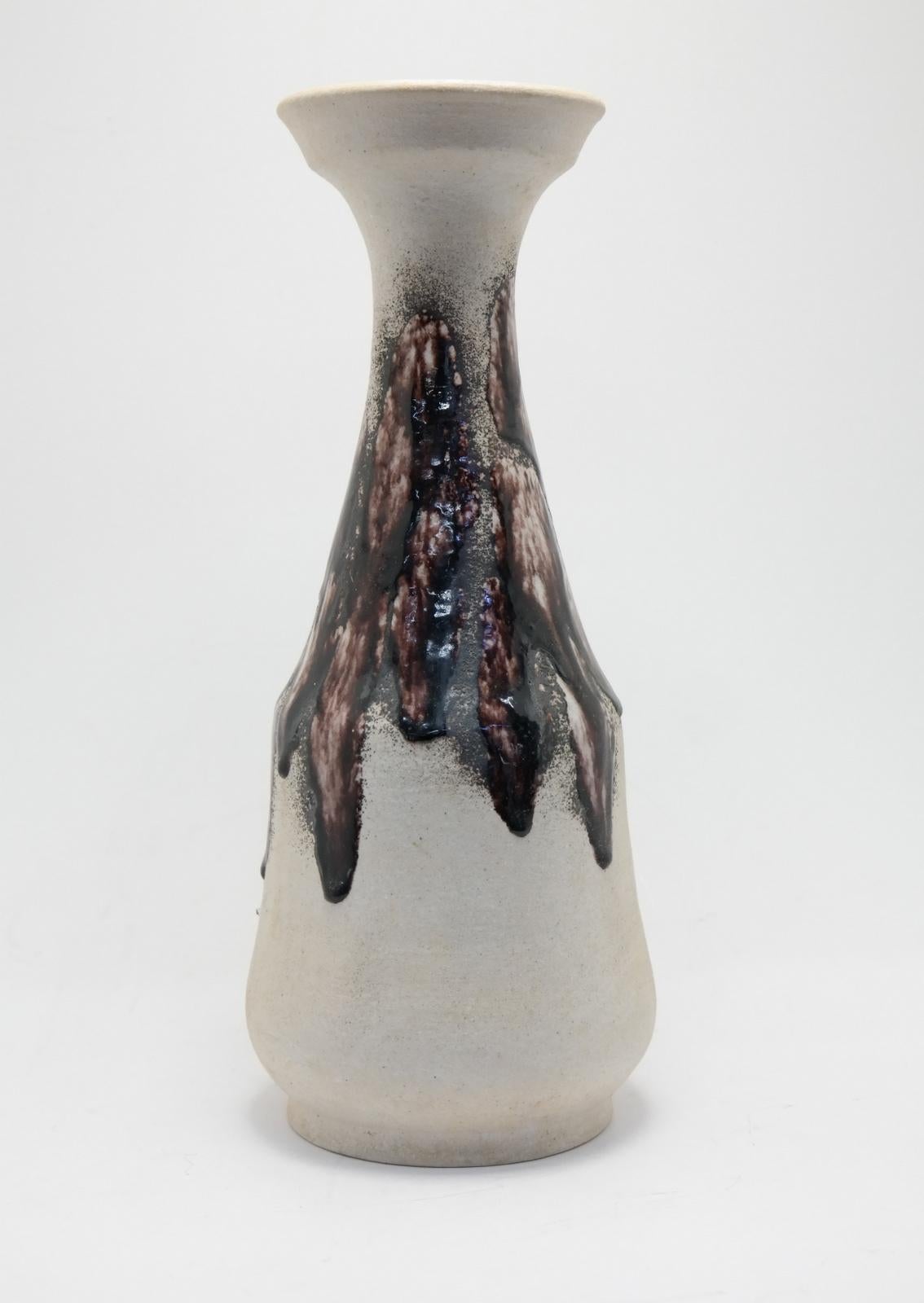 Glazed and unglazed textures, nice pastelle color on this Eva Bod vase, signed on the base.