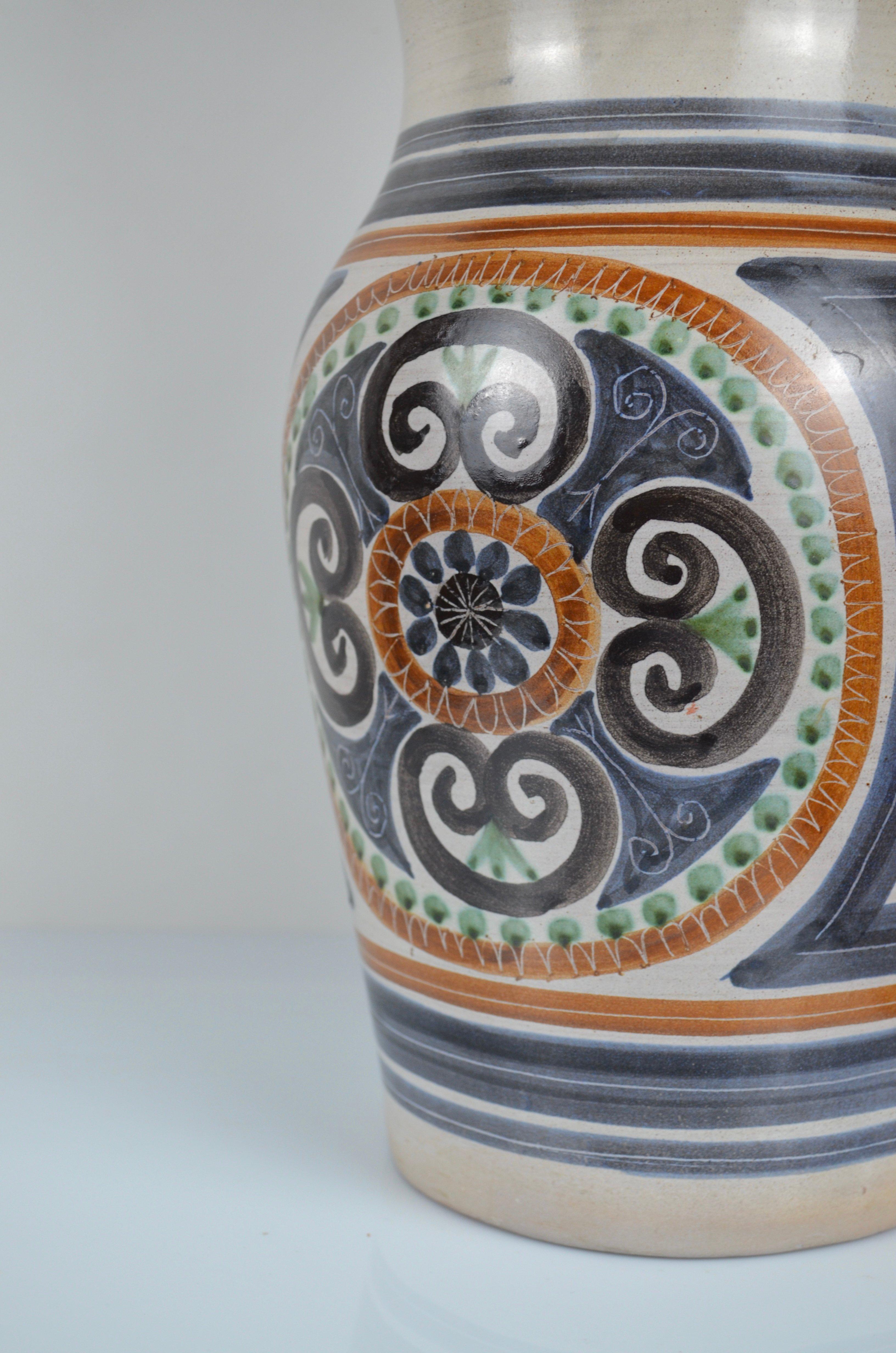 Large ceramic vase by the famous ceramist Jean de Lespinasse from Nice (France), 50-60s.
with stylized hand-painted decor.
Signed JDL under the base.
Very nice!.