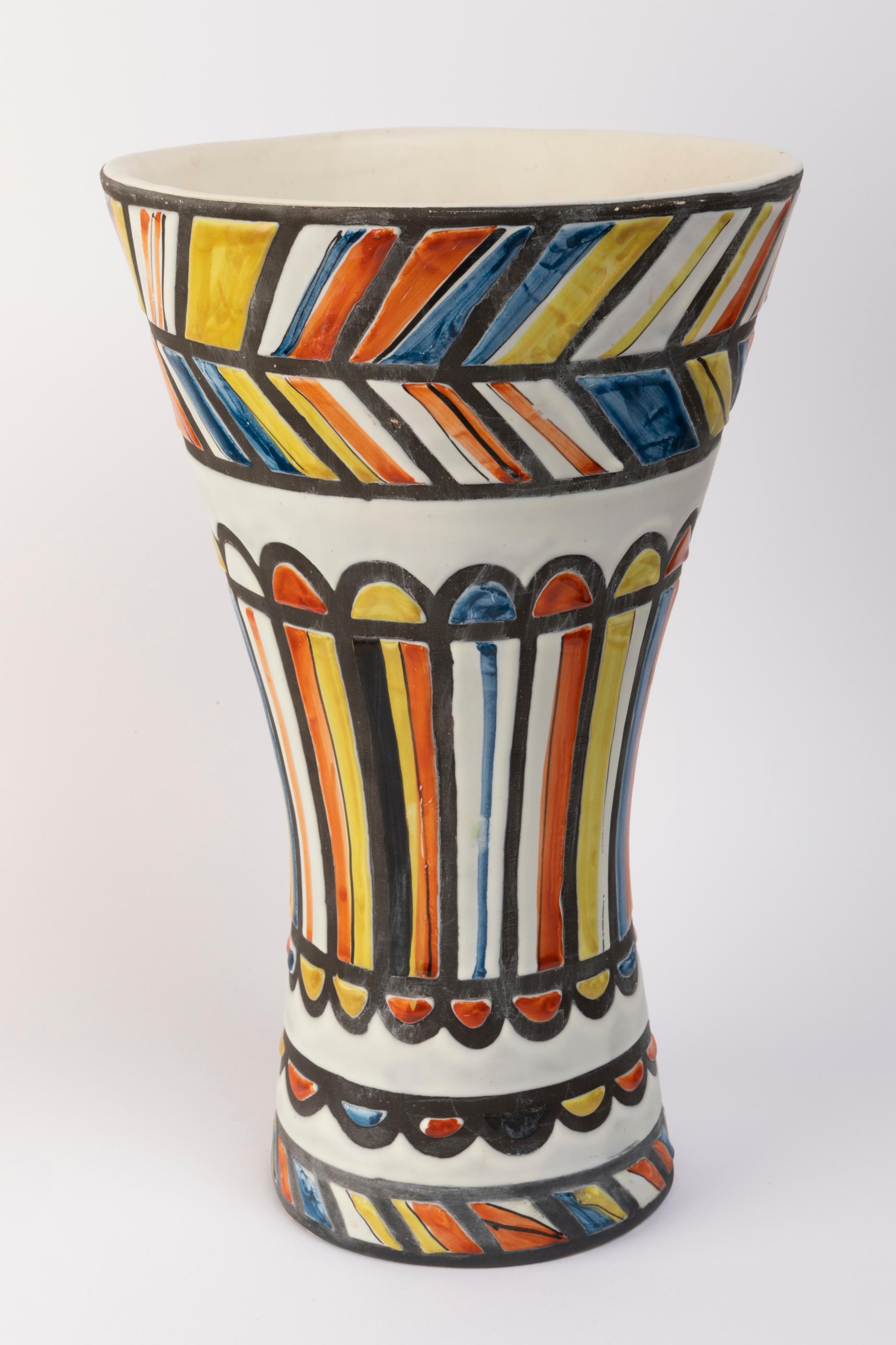Large ceramic vase
Glazed ceramic with blue, red and yellow decoration.
Signed underneath : Capron Vallauris
France, Vallauris, circa 1960s.

Measures: Height 31 cm - 12.2 in.
Diameter 19 cm - 7.5 in.