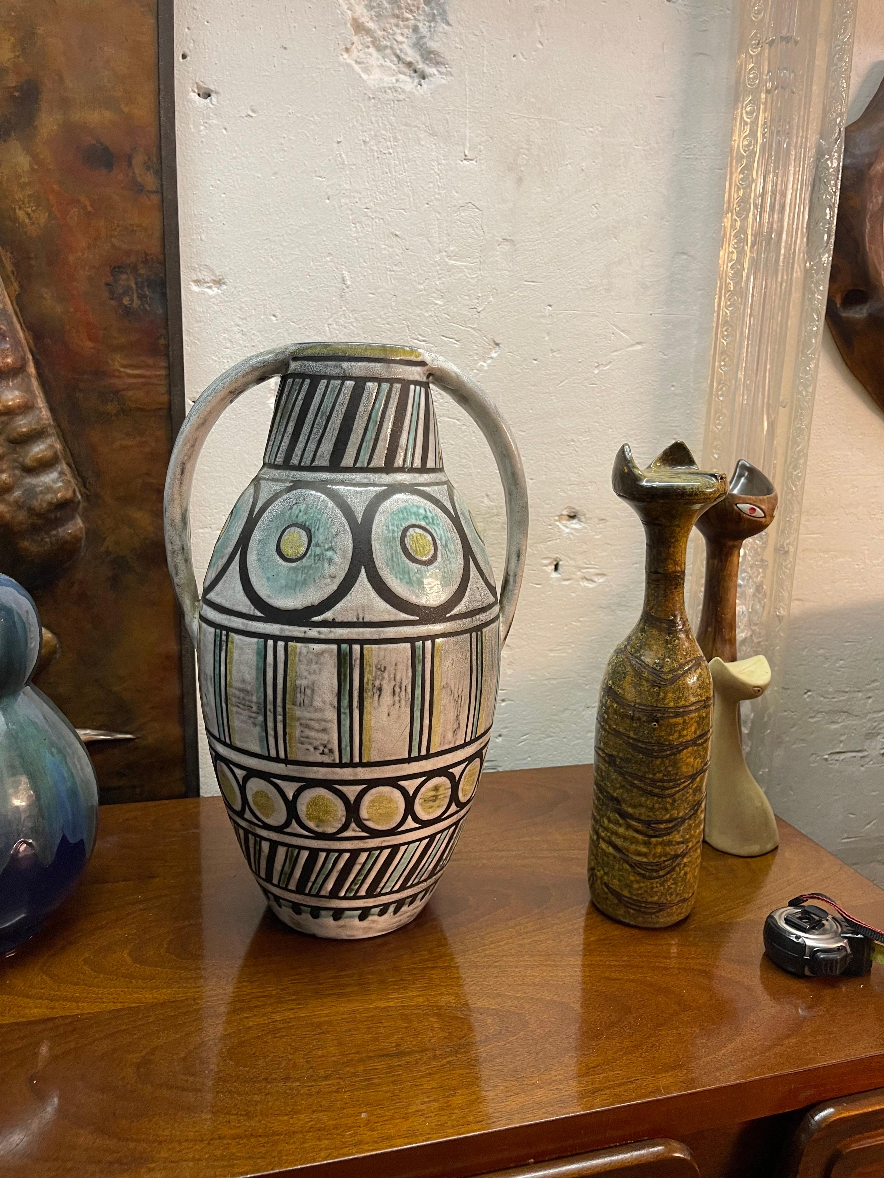 A tall ceramic vase circa 1950.