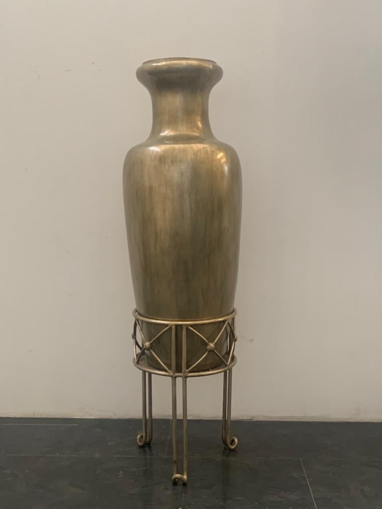 Large ceramic vase with wrought iron base all covered in silver leaf. Slight flaws.
Packaging with bubble wrap and cardboard boxes is included. If the wooden packaging is needed (fumigated crates or boxes) for US and International Shipping, it's