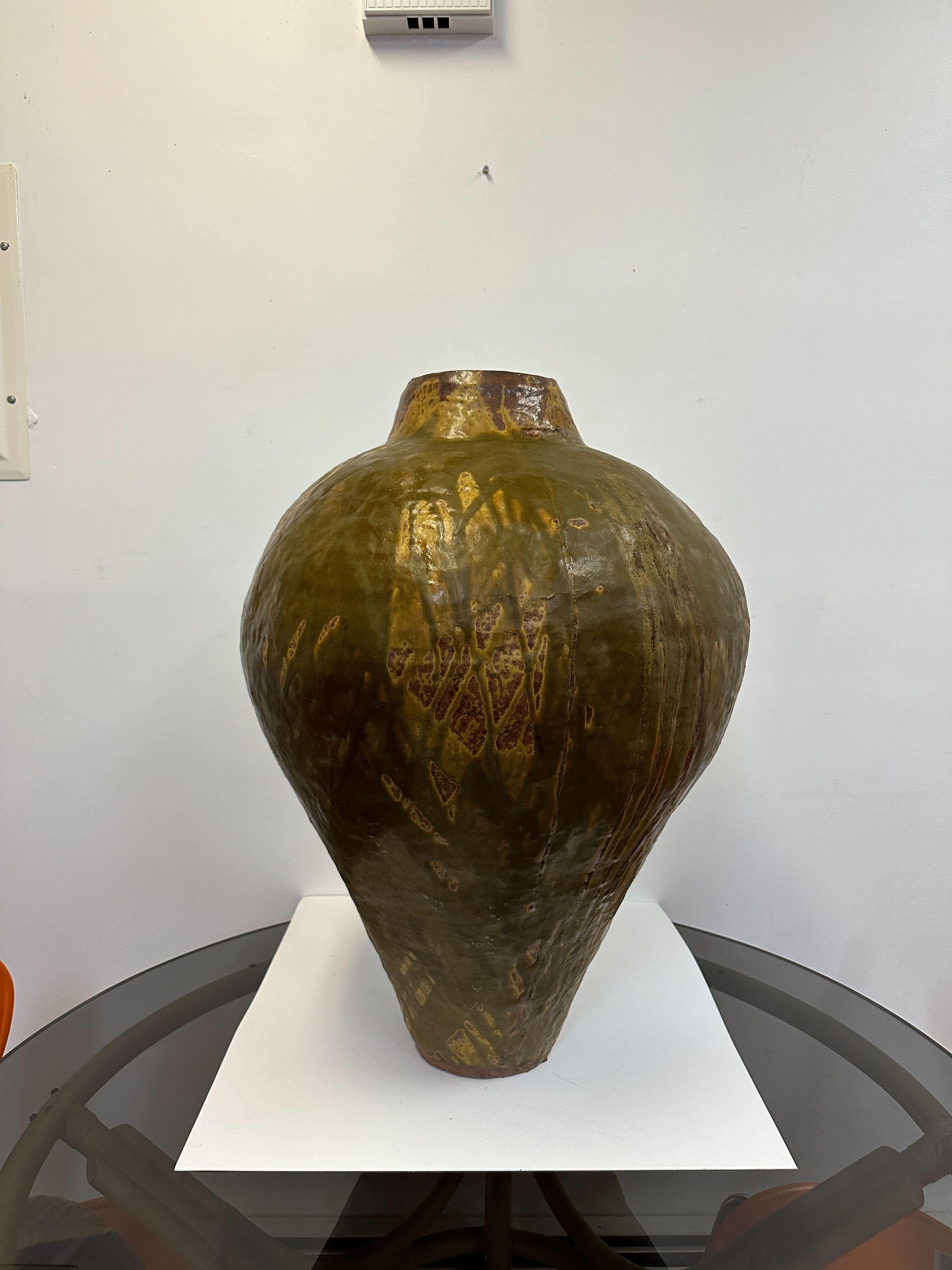 This beautiful large vessel is in very good overall condition. Resembling and in they style of Toshiko Takaezu, this work was acquired in the New Hope, PA area with the artist being unknown. Work presents well.
