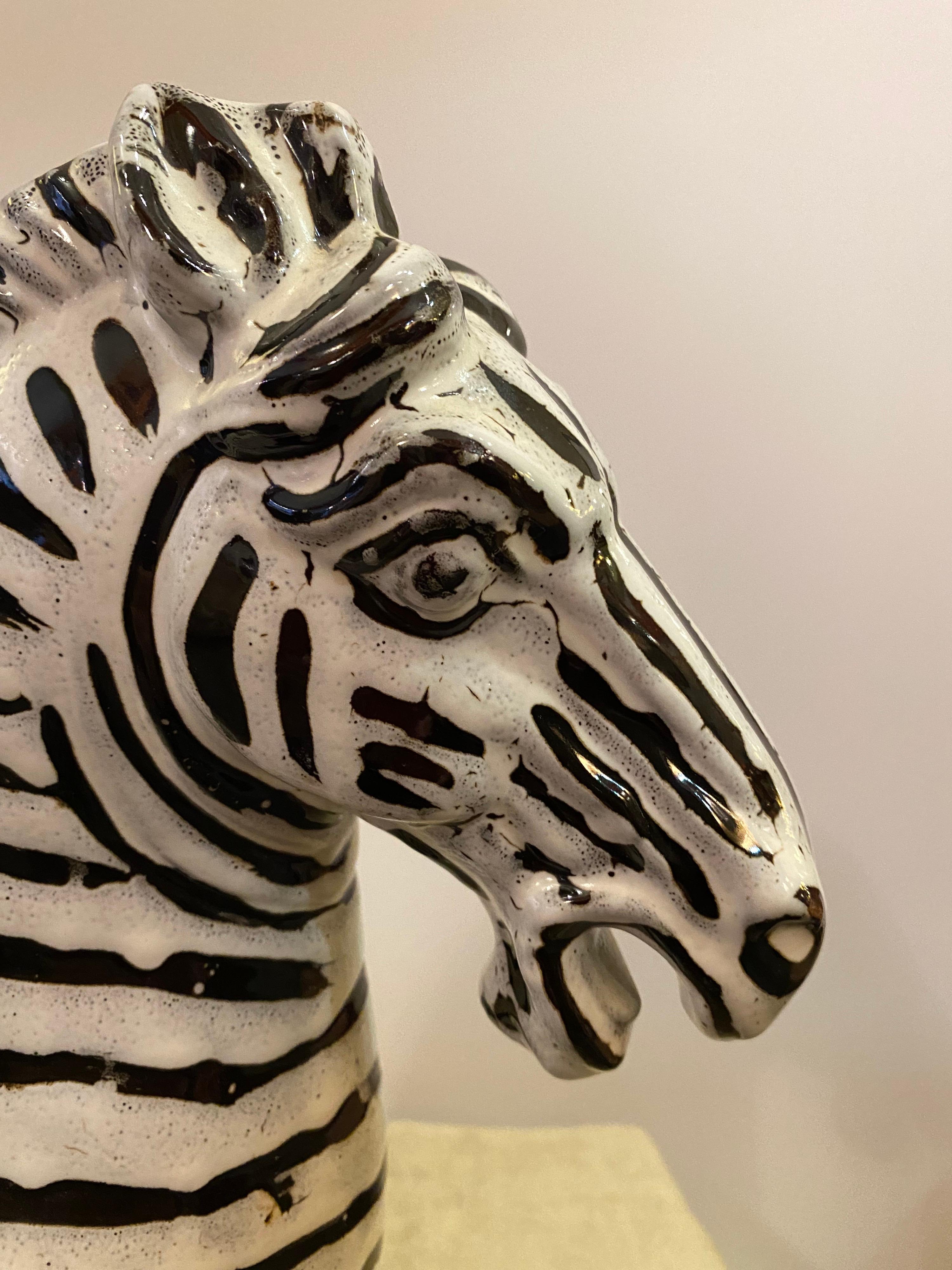 Large ceramic Zebra with stripes! Not your typical painted Zebra! I'm guess this guy is a 70's or 80's Zebra. Nice heavy glaze done in stripes. Doesn't strike me as Italian, but thinking it might be from Portugal or Spain. Great look!