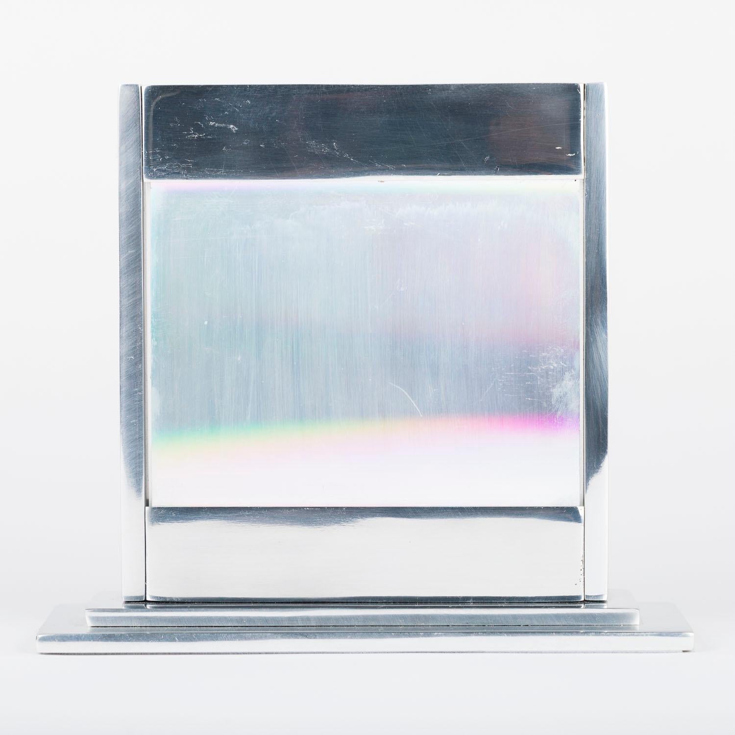 A large certified precision ruled diffraction grating by Bausch & Lomb of Rochester, New York.

600 grooves / mm
Blaze angle 28 degrees, 41 minutes.
Radius concave

Serial number: 889-8-1-3
Catalogue number 35 53 12 55

Window: 4 x 5 1/4 inches. (10