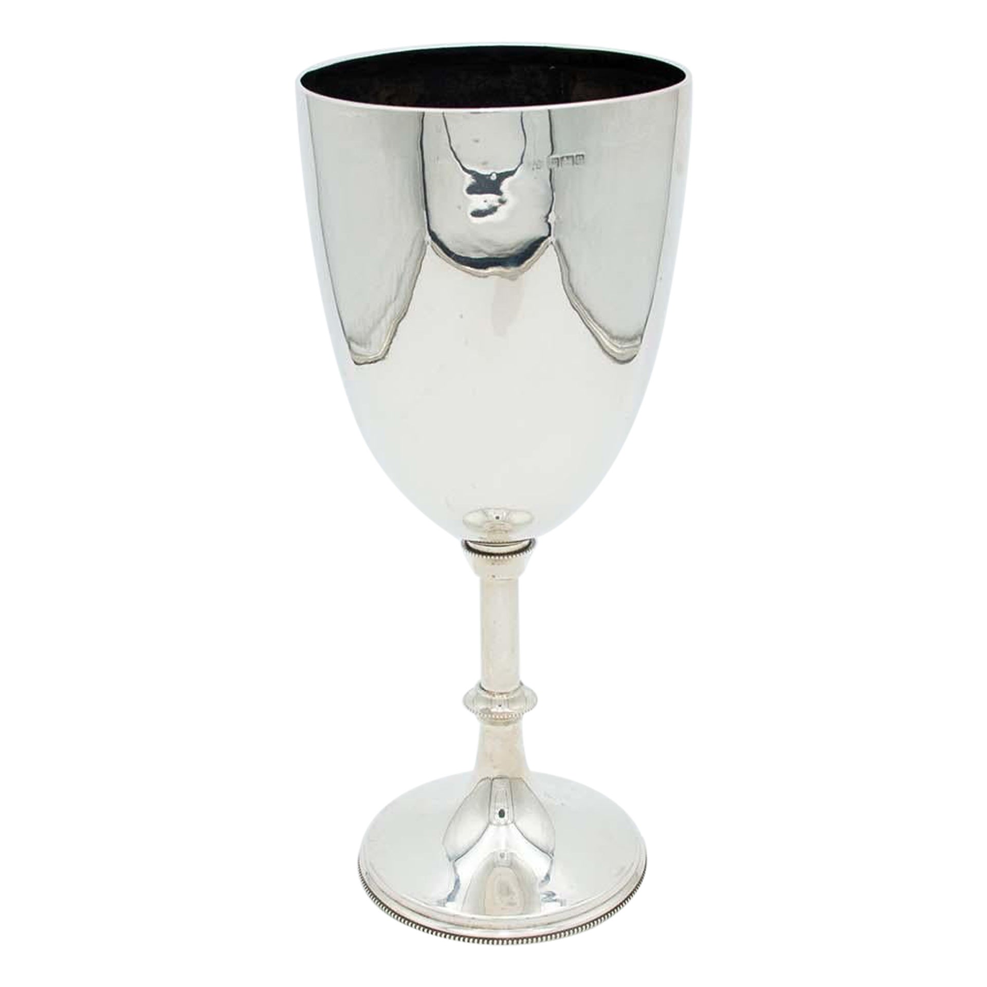 Large chalice in smooth silver with pearly friezes and a circular base
