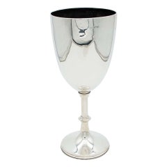 Large chalice in smooth silver with pearly friezes and a circular base