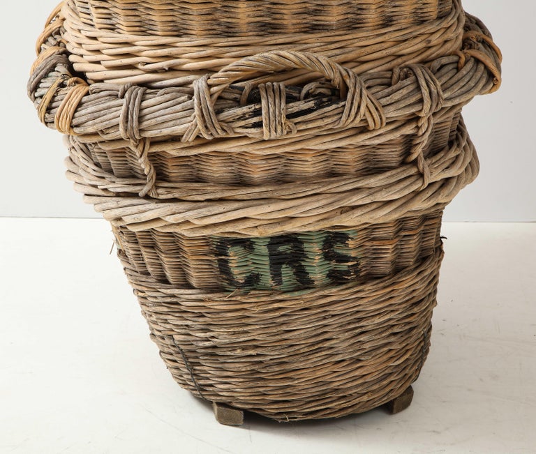 Only 5 left - sold individually

Large Champagne grape harvest baskets, Reims, France, c. 1920-30

These are great for firewood, pool towels, laundry, and just about anywhere you need a beautiful generous collect-all to hide mess. Perfect for