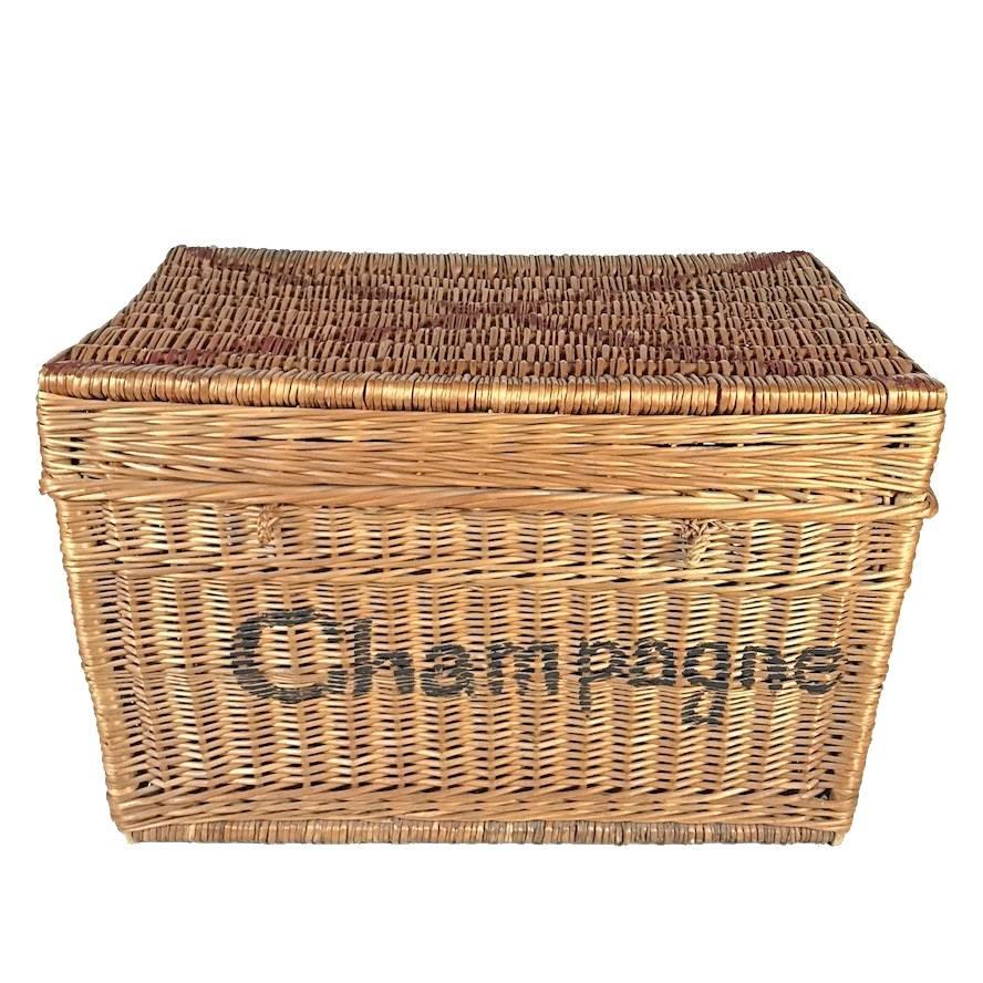 Early unique wicker trunk handmade in France in 1930s. The woven willow wicker trunk has a lid and two handles. The basket is in excellent condition with nice patina. It was used as a champagne bottle chest.
I found this rare object at an antique
