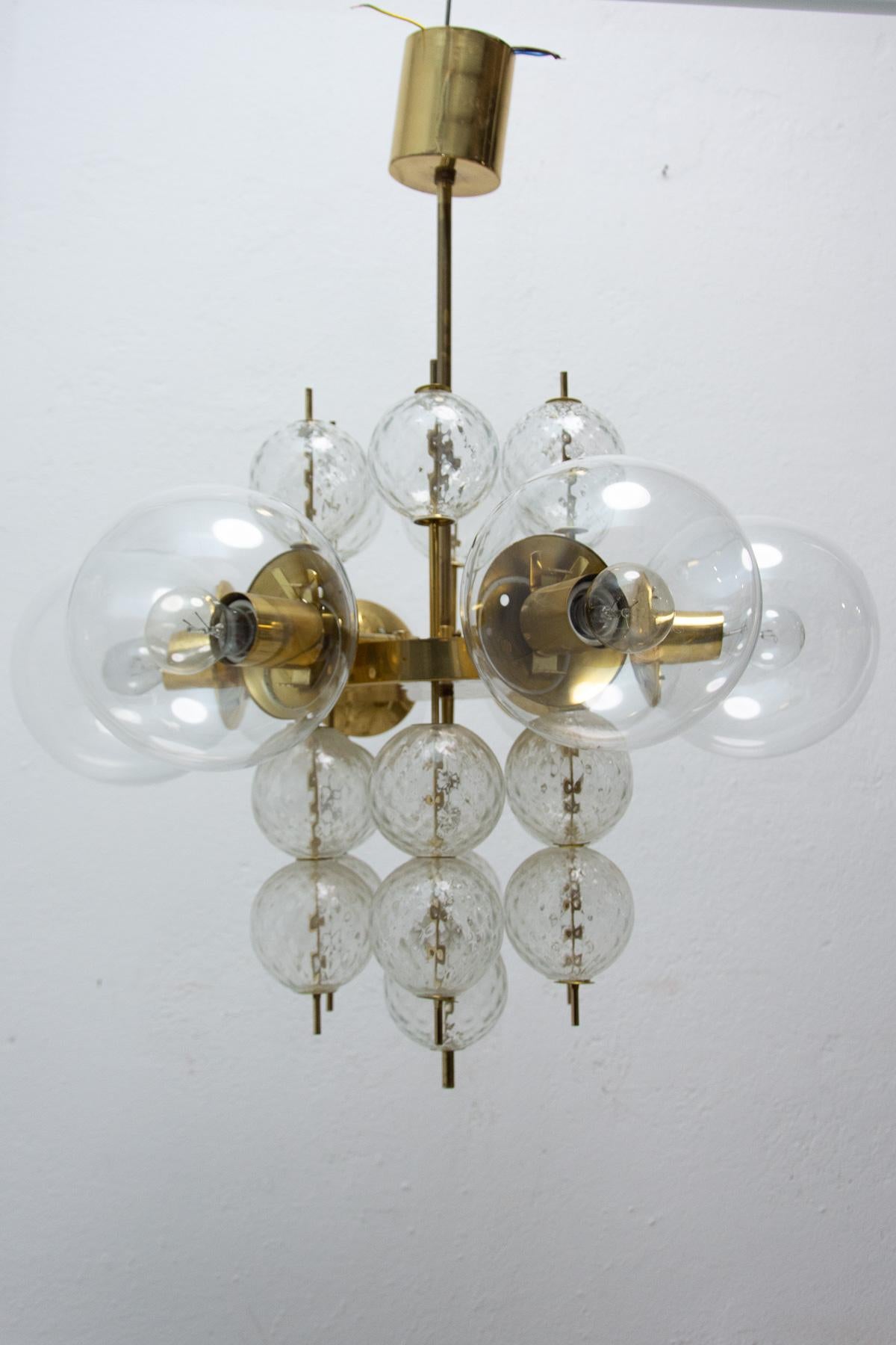 This chandelier was made by Kamenický Šenov company in the 1970´s in the former Czechoslovakia.

It is made of black sheet metal, glass, chrome and metal.

New wiring, cleaned, in good Vintage condition.

E27 bulbs, UP to 250 V.

