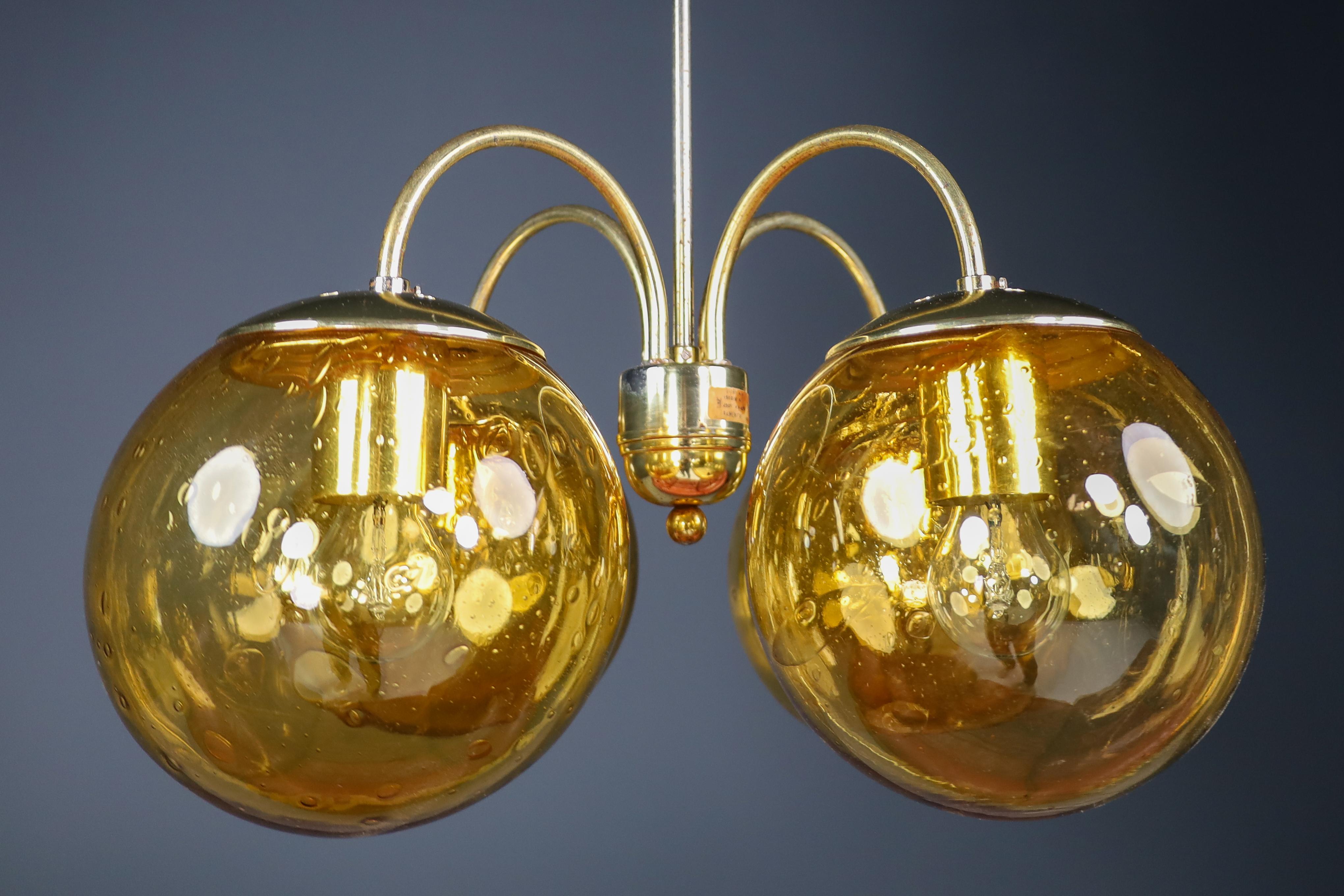 Large Chandelier in Amber Hand Blown Colored Glass Globes & Brass, Europe, 1970s For Sale 5