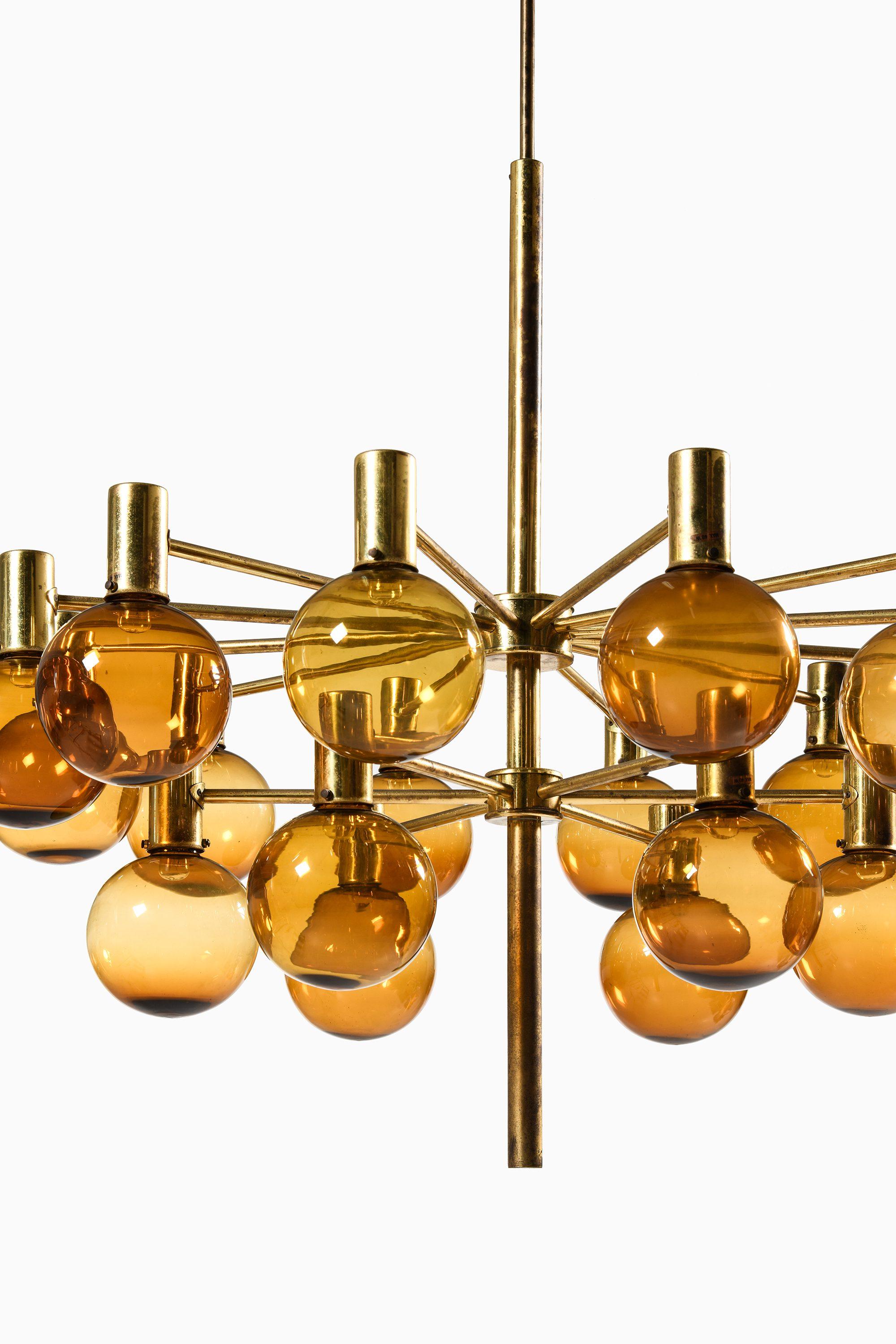 Swedish Large Chandelier in Brass and Amber Glass by Hans-Agne Jakobsson, 1950's For Sale