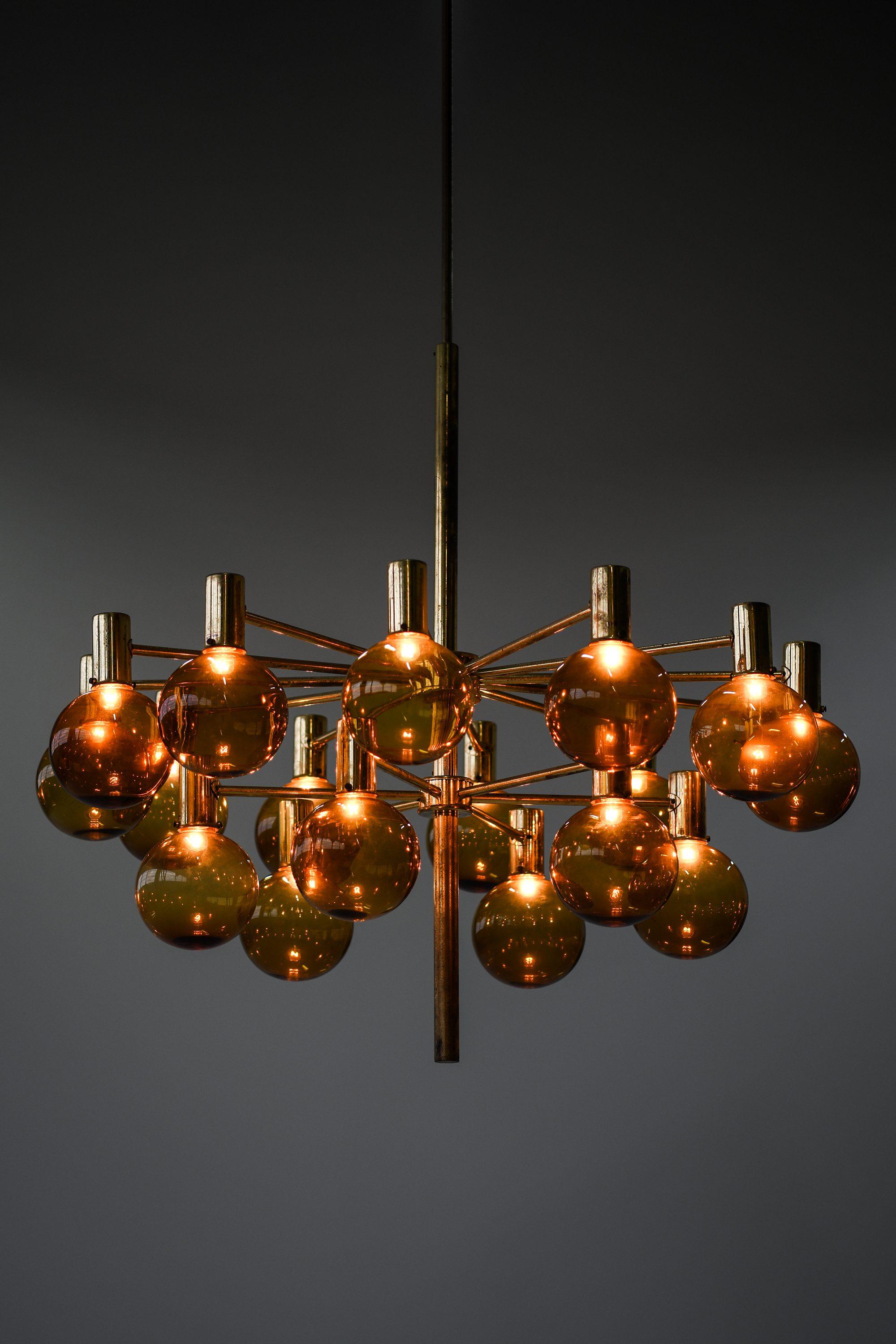 20th Century Large Chandelier in Brass and Amber Glass by Hans-Agne Jakobsson, 1950's For Sale
