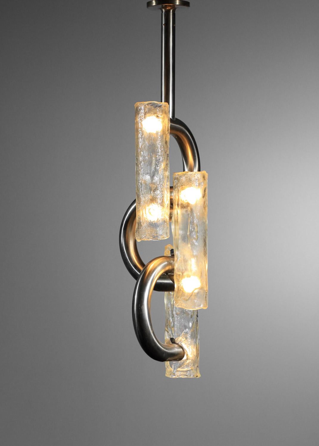 Large Italian suspension lamp edited by Stilux in the 50's modernist. Nickel-plated steel structure and thick transparent cast glass shade. Very nice vintage condition, note the traces of oxidation on the metal. Original electrical system, 6 LED