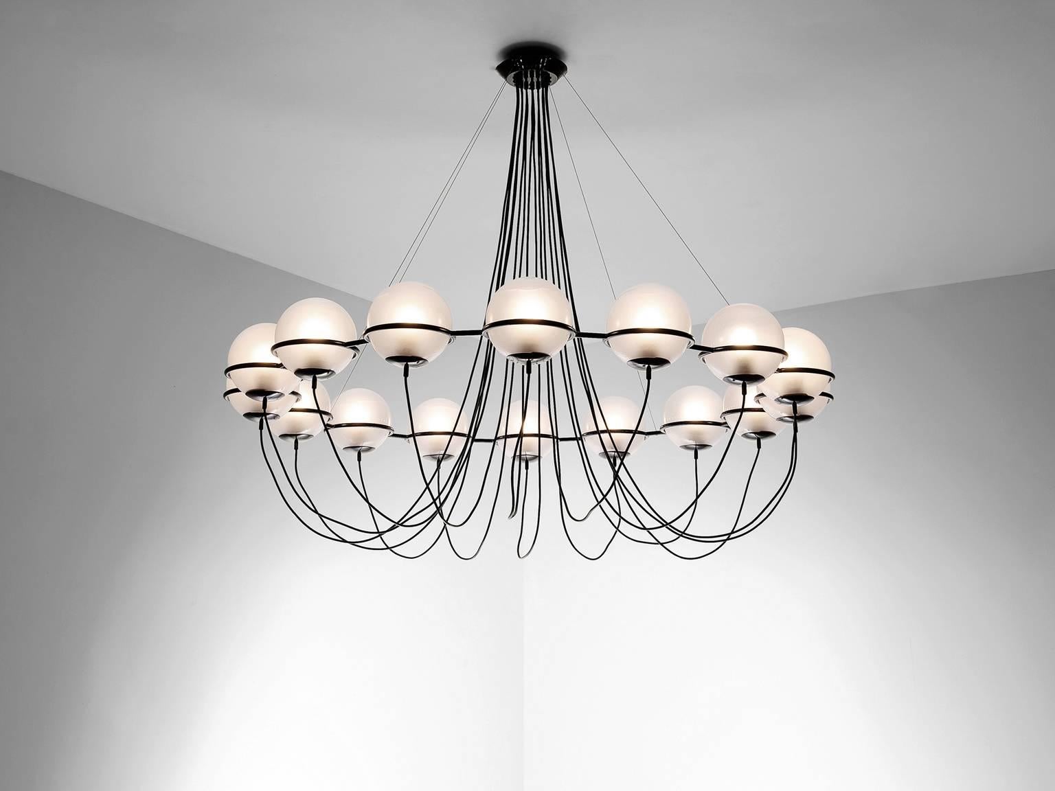 Large chandelier, metal and glass, Europe, 1970s.

Large 180 cm diameter chandeliers with 16 glass spheres. This design is inspired on the earlier designs of Gino Sarfatti for Arteluce, but this is as well very nice designed and has great look and