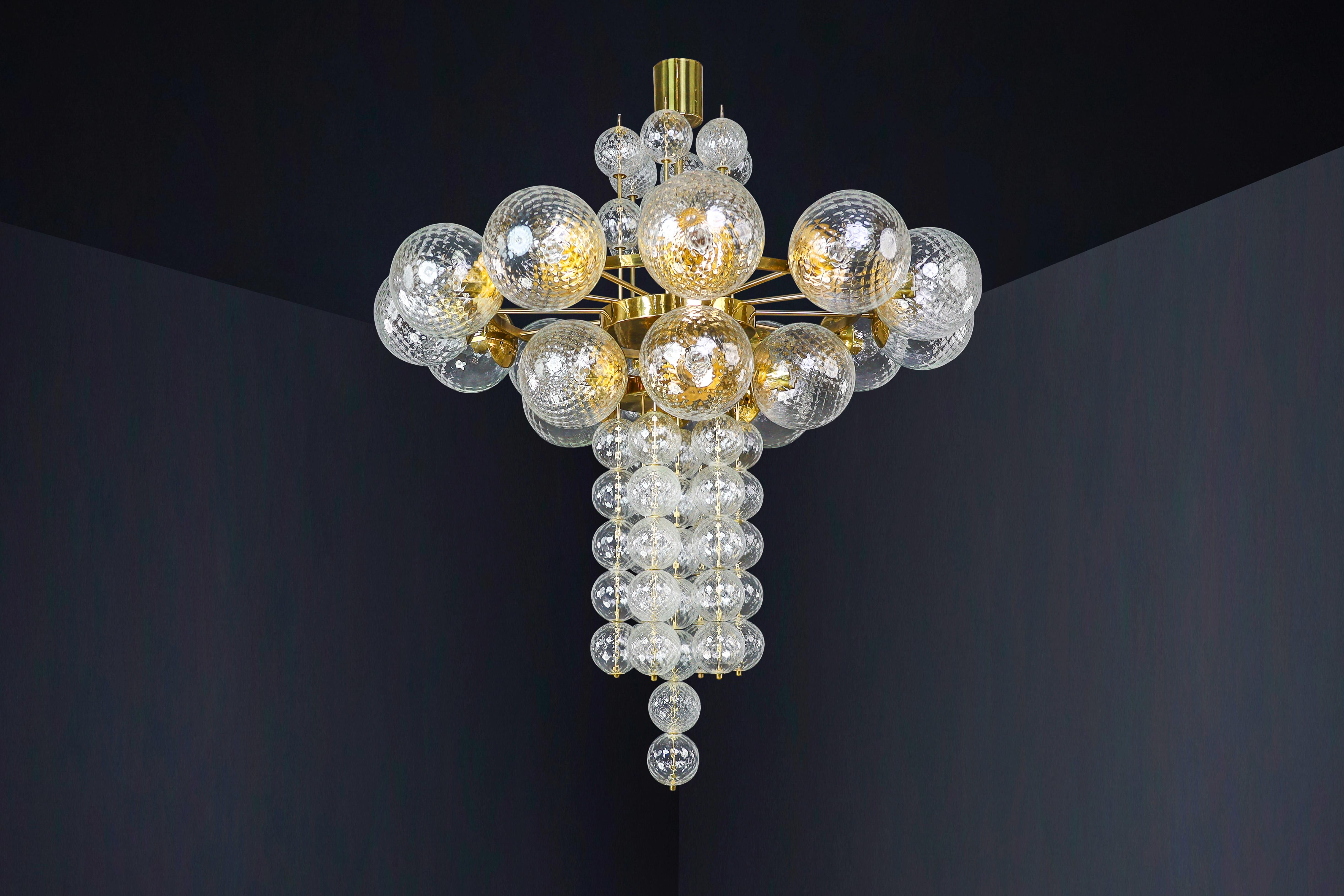 Large Chandelier with brass fixture and hand-blowed glass globes by Preciosa Cz. For Sale 3
