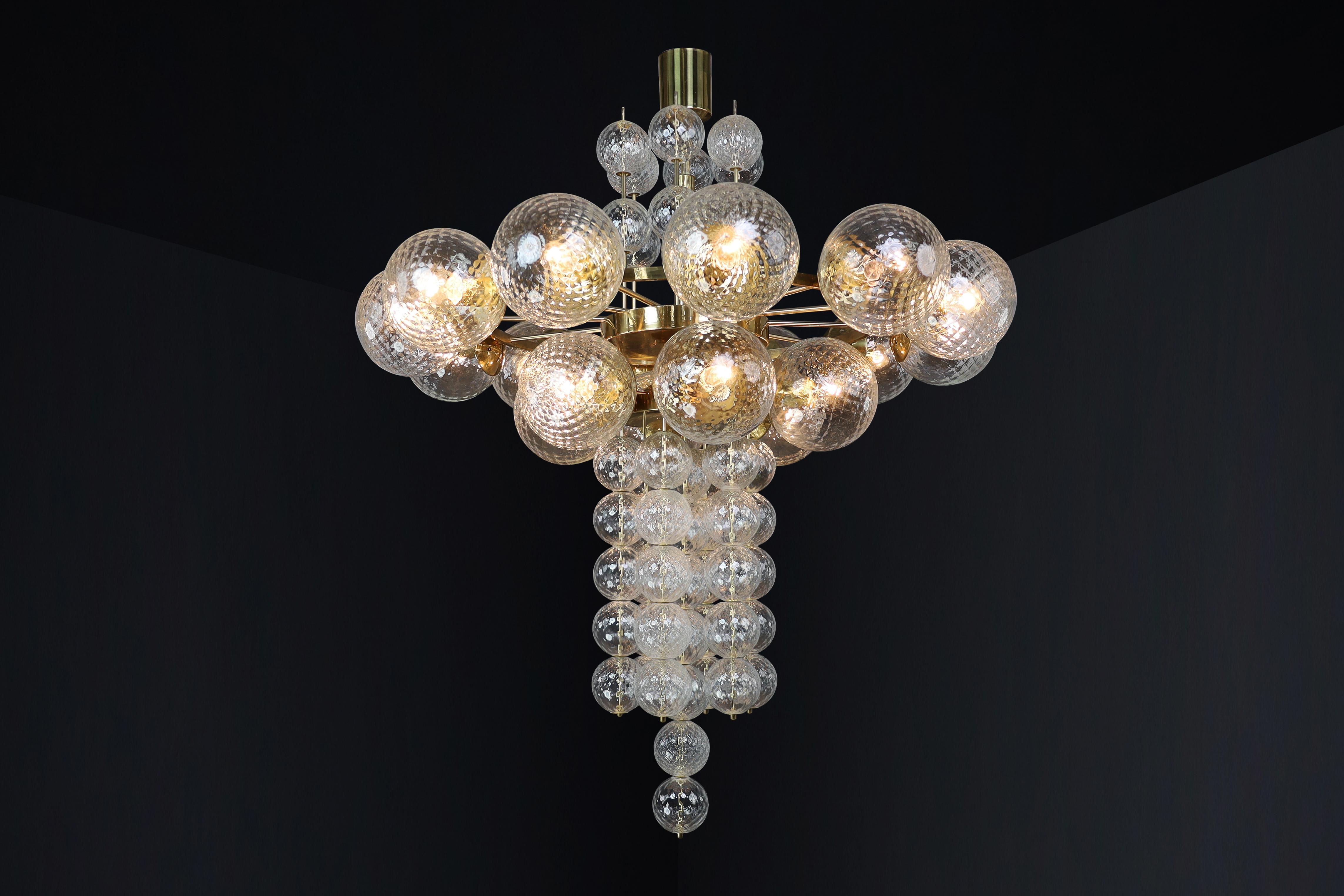 Large Chandelier with brass fixture and hand-blowed glass globes by Preciosa Cz. For Sale 4