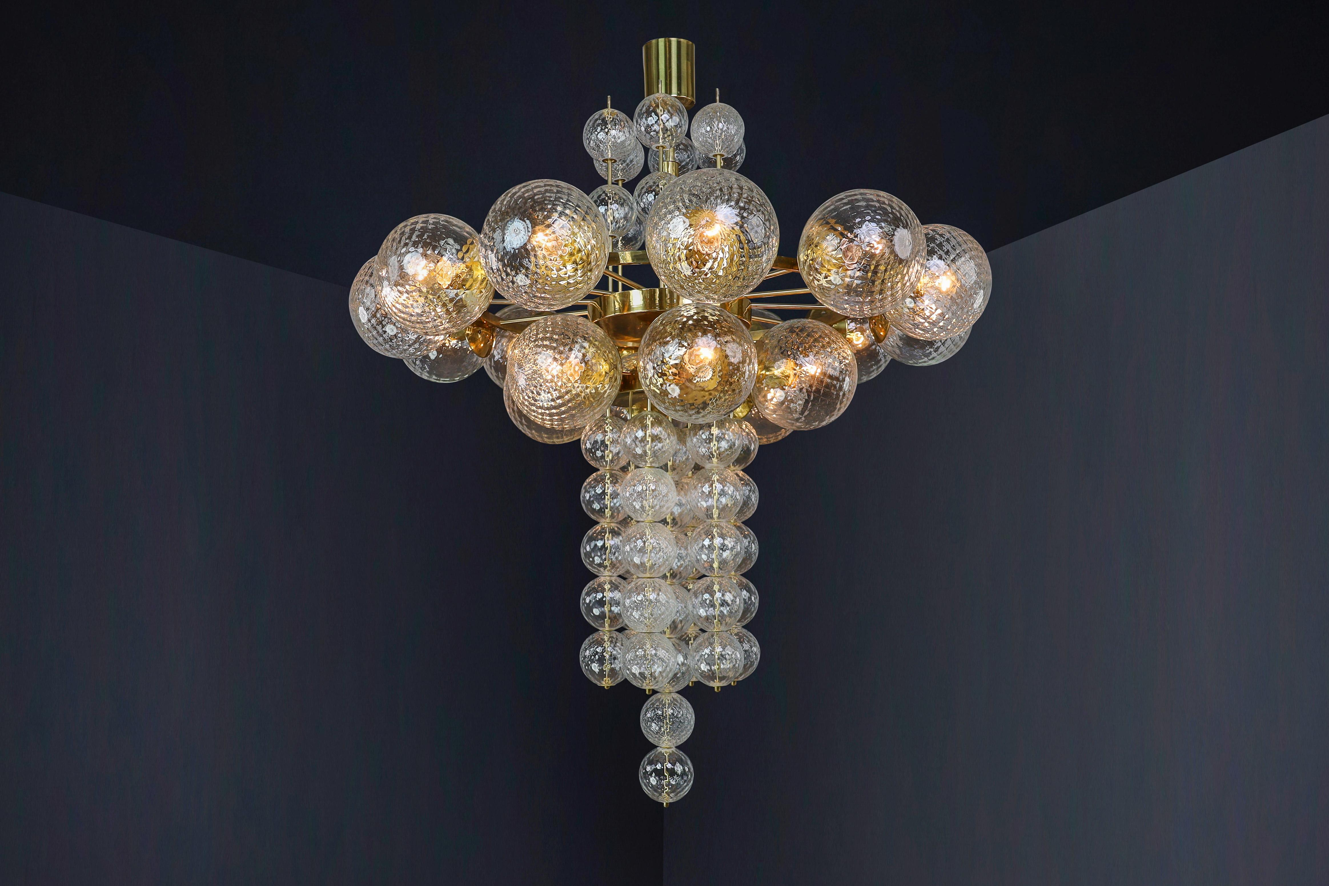 Large Chandelier with brass fixture and hand-blowed glass globes by Preciosa Cz. For Sale 6