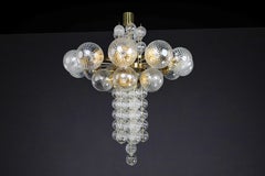 Large Chandelier with brass fixture and hand-blowed glass globes by Preciosa Cz.