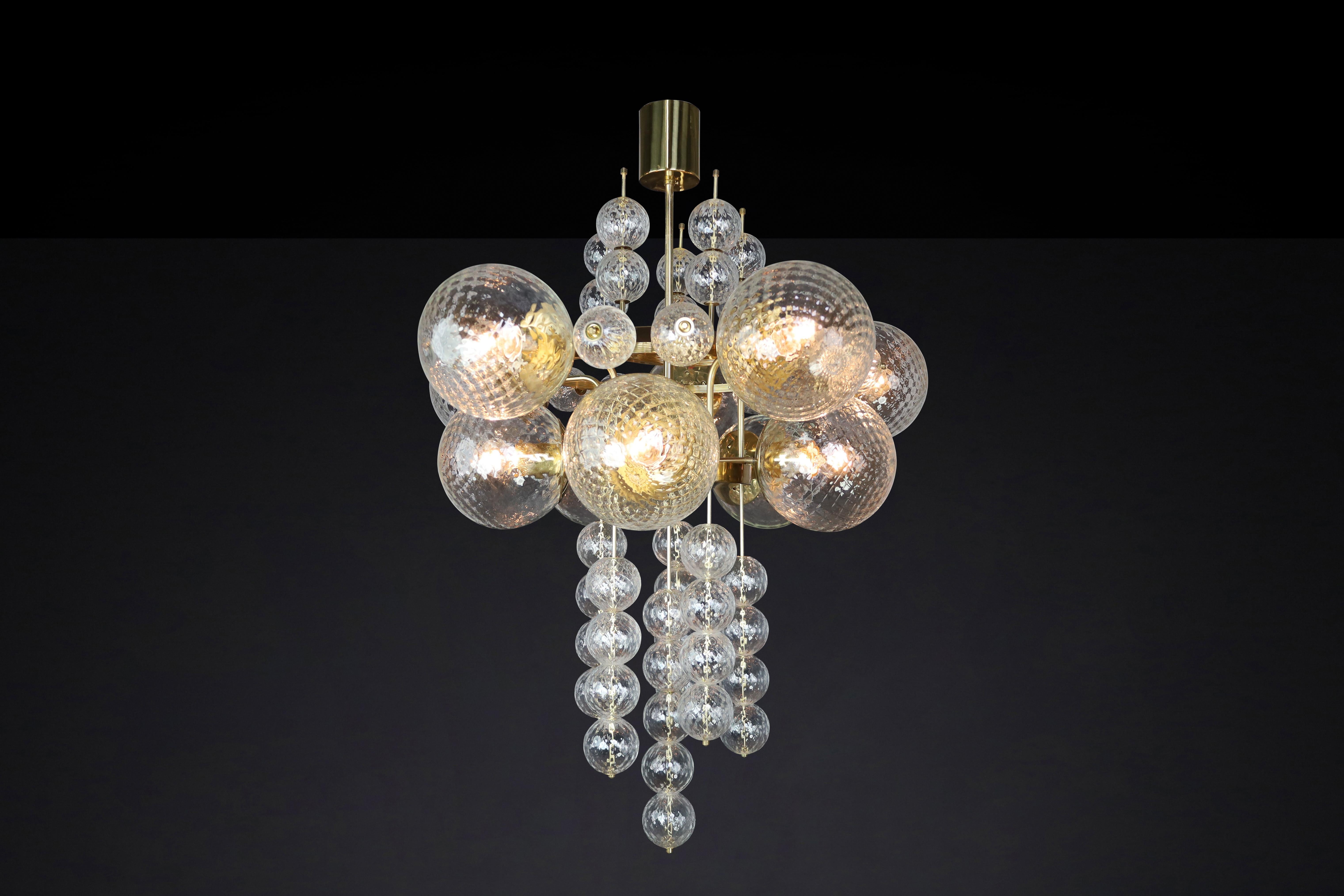 Czech Large Chandelier with brass fixture and hand-blowed glass globes by Preciosa Cz. For Sale