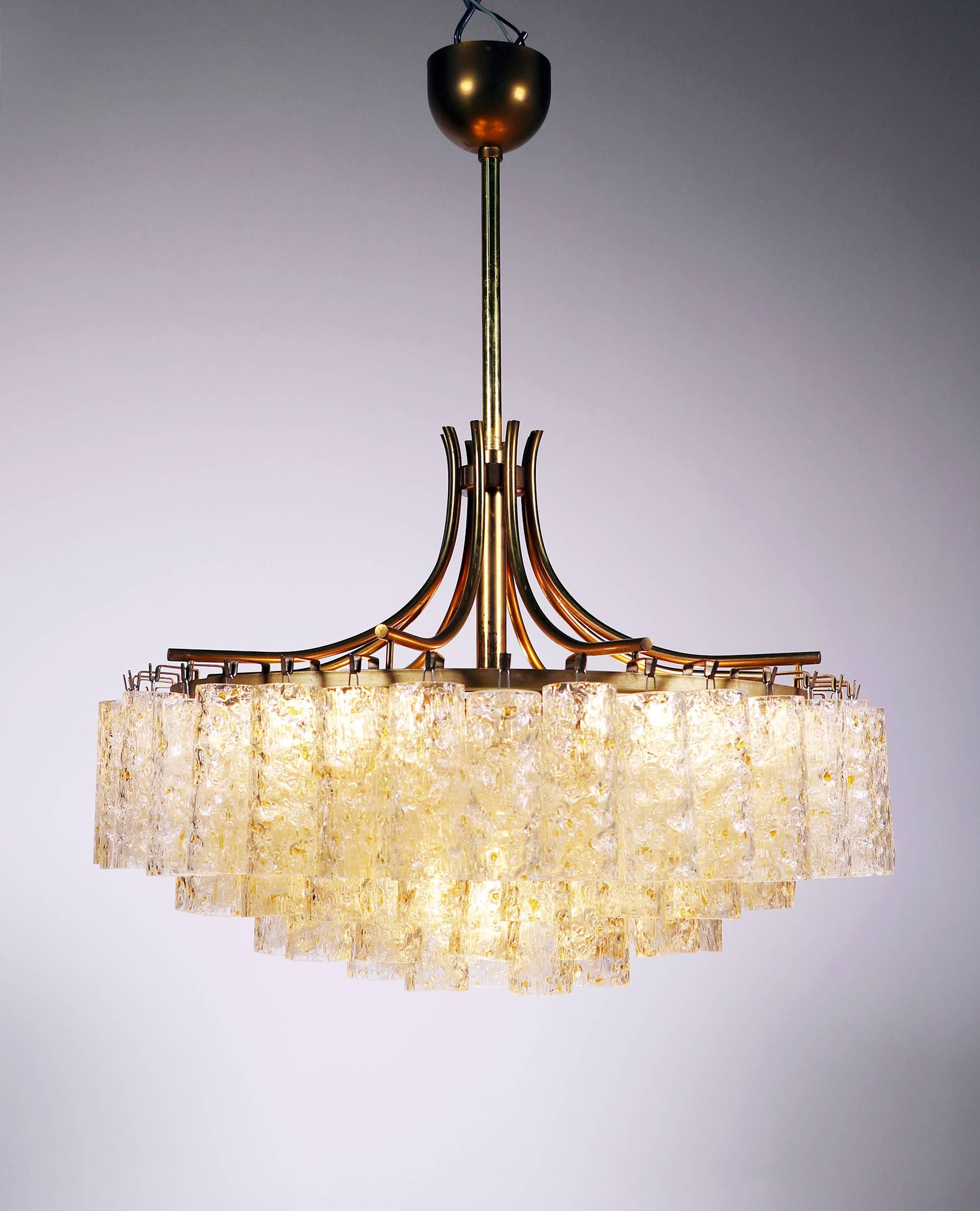 Large chandelier with 78 gold flaked Murano glass tubes on a brass frame.
Made by Doria, Germany in the 1960s. 
The lamp takes nine small Edison bulbs, one in the middle and eight bulbs around.
One replacement part is included.
Diameter 19.7 in / 50