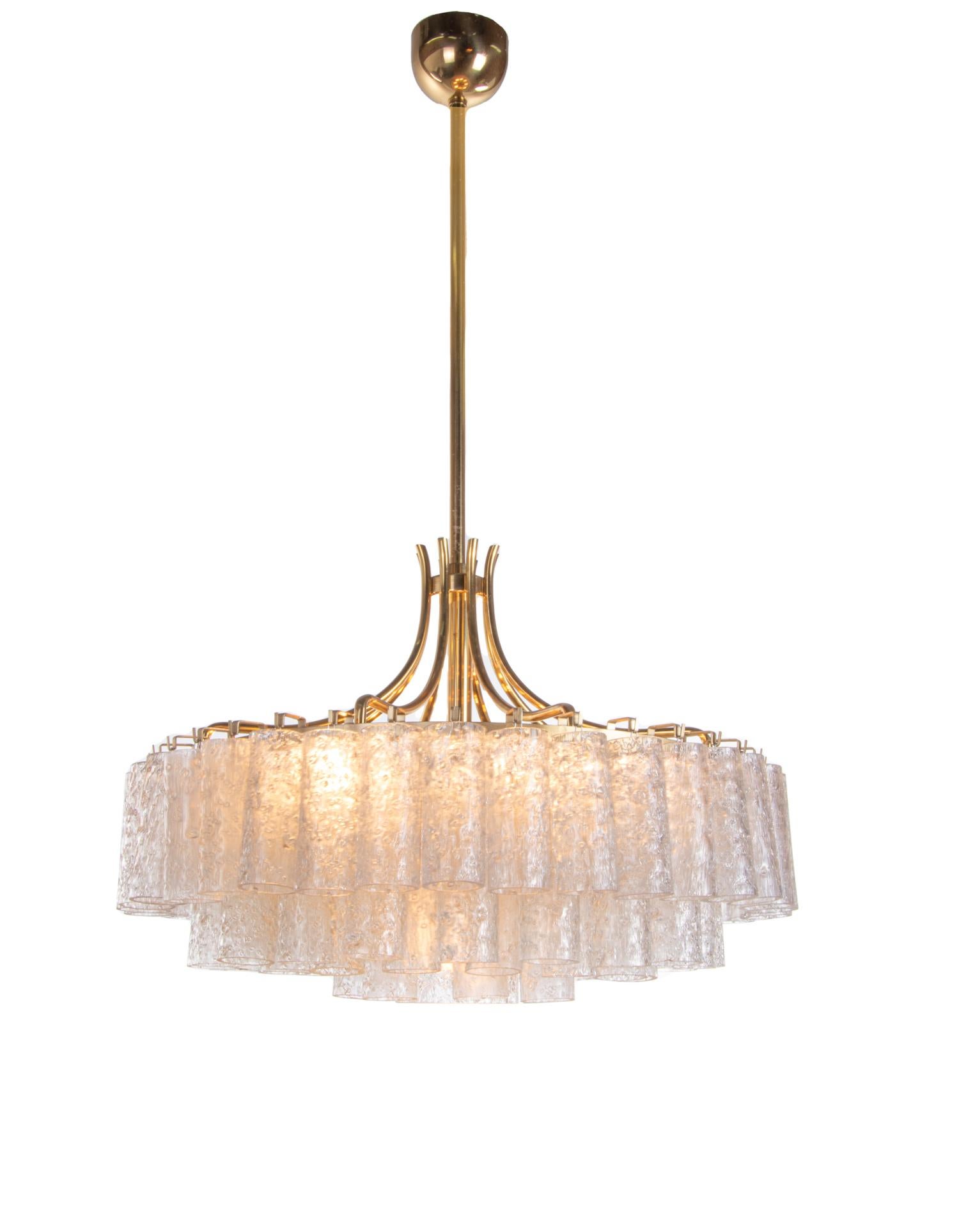 Large chandelier with clear Murano glass tubes on a brass frame. 
Made by Doria, Germany in the 1960s. 
The lamp takes nine small Edison bulbs, one in the middle and eight bulbs around. 
Diameter 19.7 in / 50 cm, height 32.3 in / 82 cm.