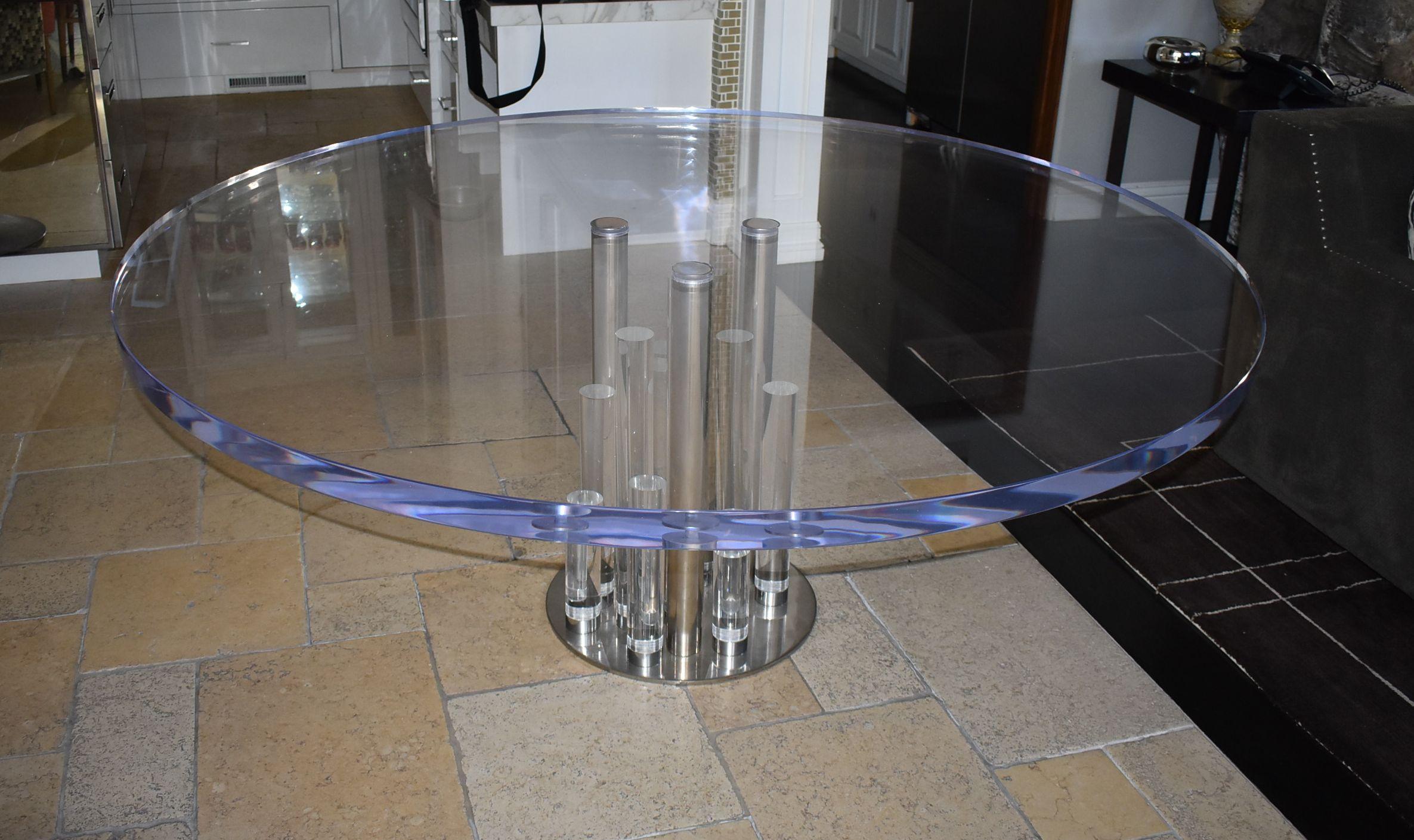 6ft diameter Lucite dining table with 2 inches thick top and chrome details design by Charles Hollis Jones part of his Post Line Collection.
Measure: Diameter of base 20 inches

Provenance: Directly from Charles Hollis Jones private