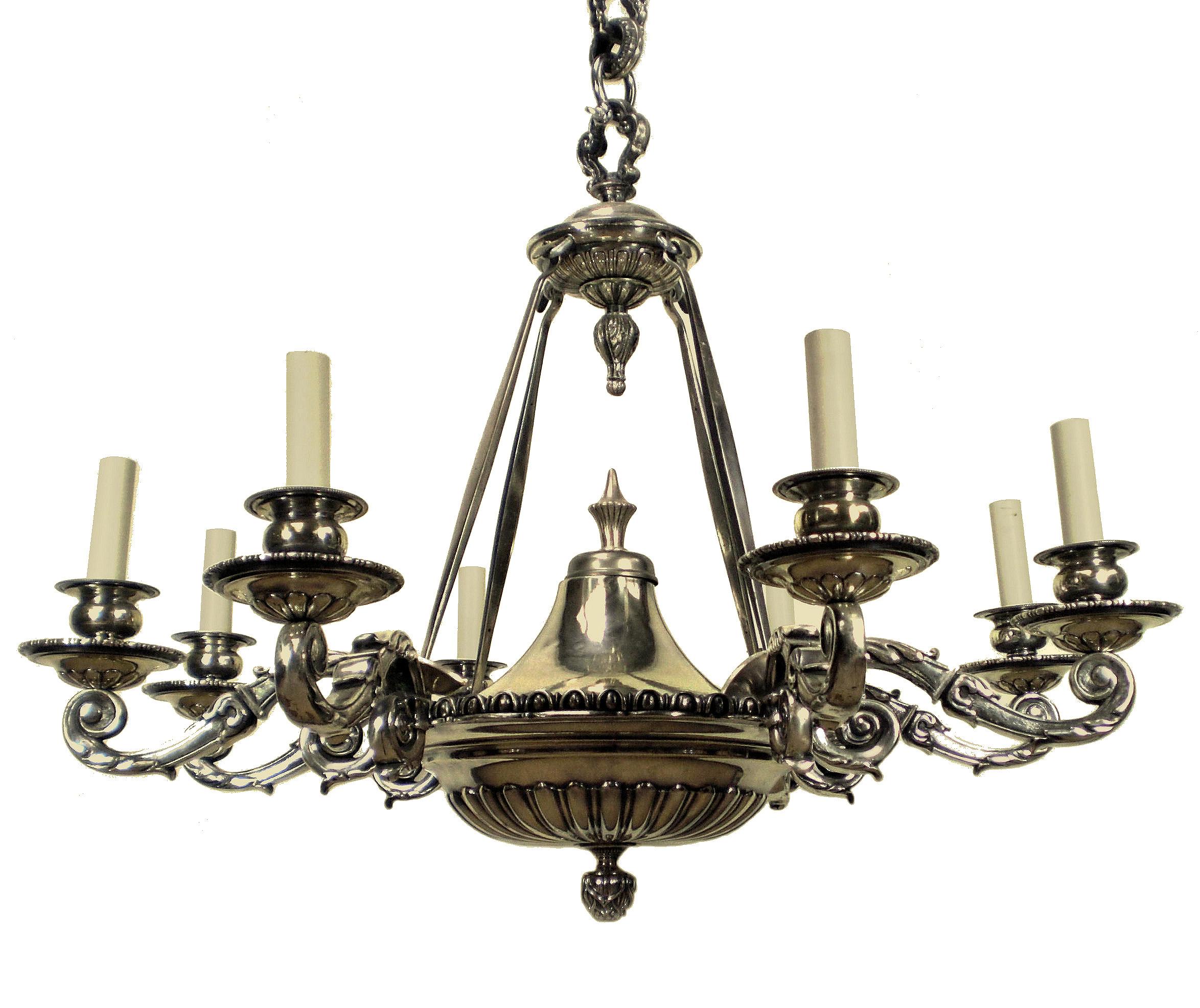 A large and impressive English six branch Charles II style chandelier in silver plated bronze.
