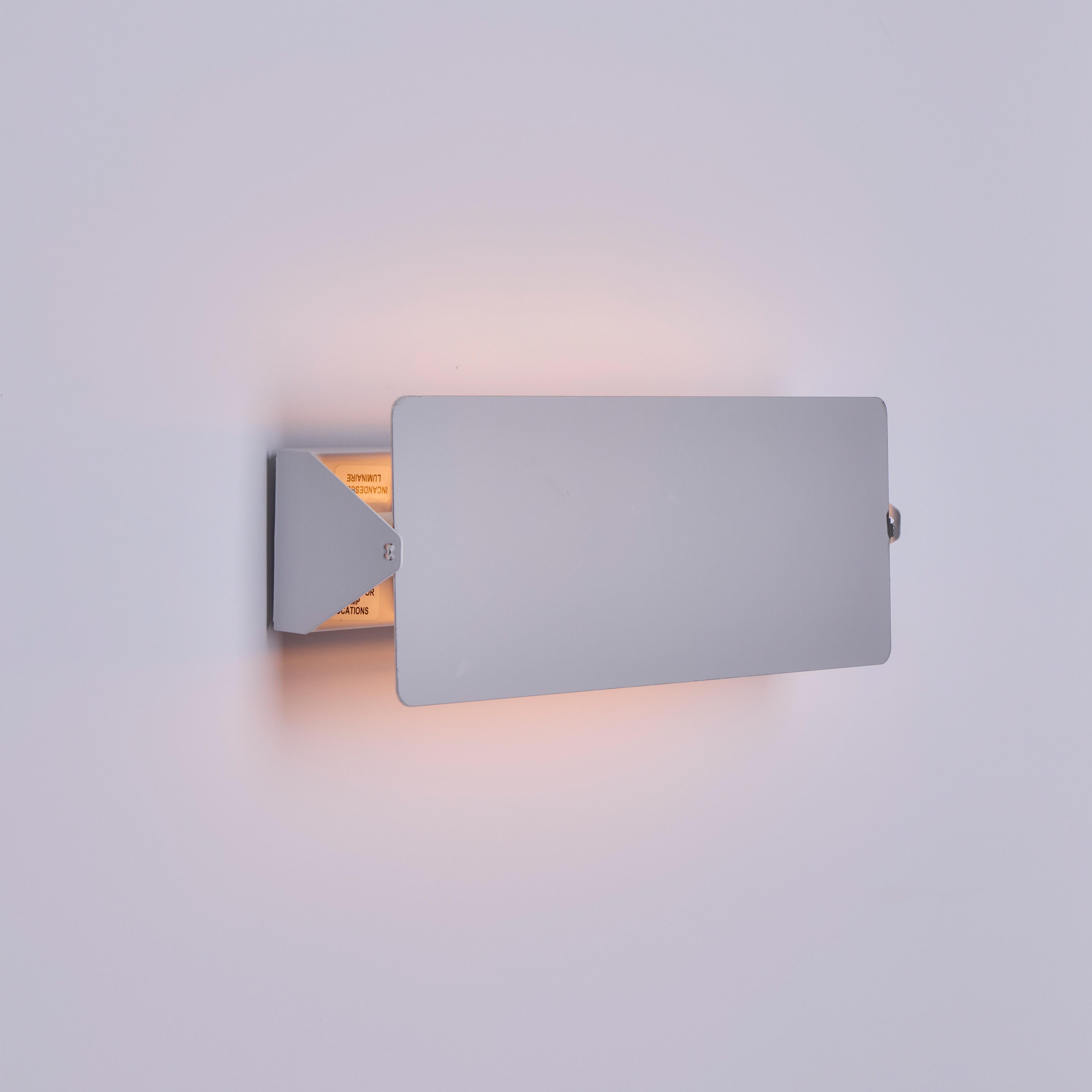 Large Charlotte Perriand 'Applique À Volet Pivotant Double' Mirrored Wall Light.

Originally designed in the 1950s as the iconic CP1, these newly produced authorized re-editions are still made in Italy with the highest level of integrity and