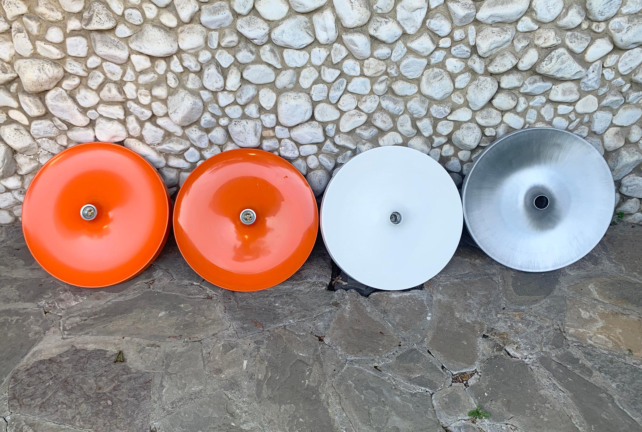 Set of 4 big Space Age Flush lights from the 1960s, manufactured in Germany. 

These lights were commissioned / selected by Charlotte Perriand for the interior design of the flats of the 'Les Arcs' and Méribel Ski Resorts in the French Alps.

This