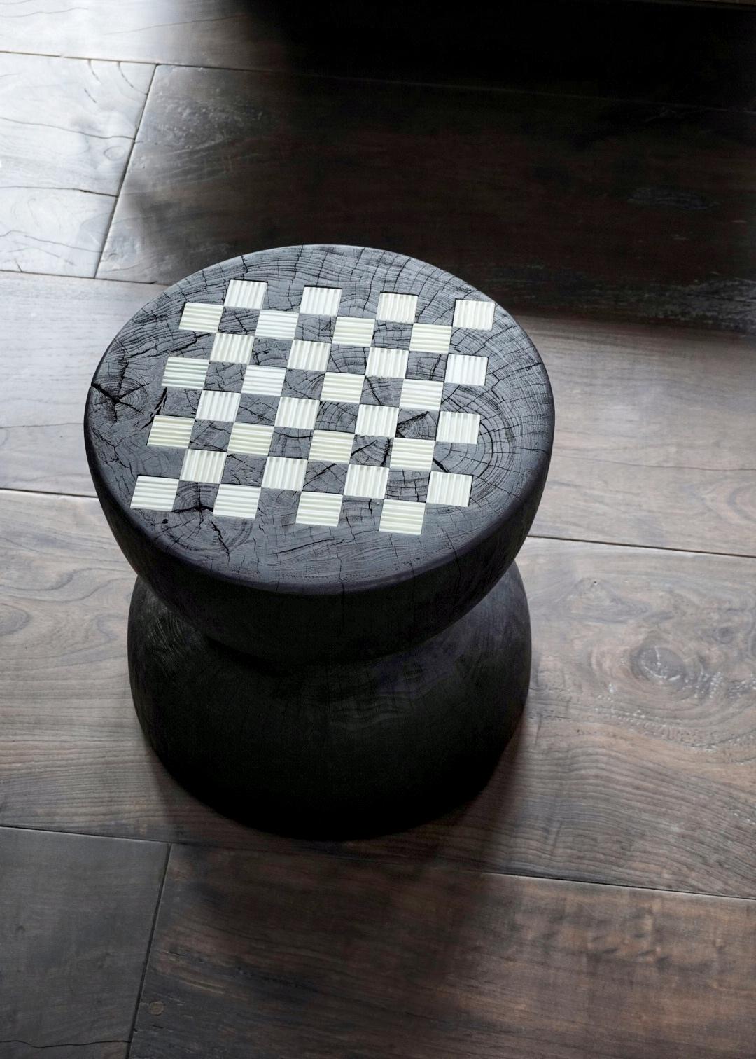 Chess table
This Board Games edition presents classic games and decorative pieces like Backgammon, Chess and Tic Tac Toe, made out of wood and glass. 
Since 2000, Orfeo Quagliata offers a remarkable consistency based in design and a fine technical