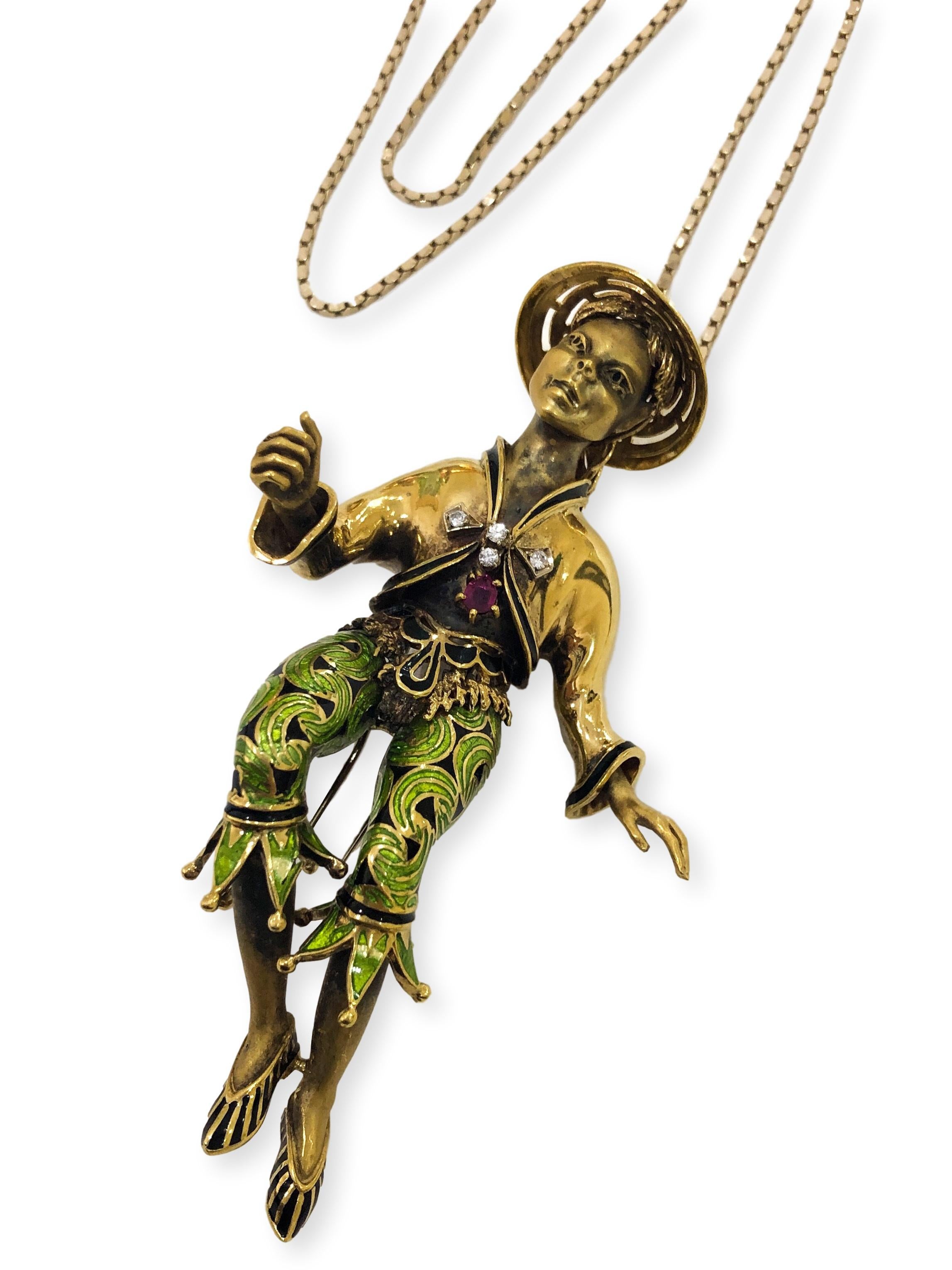 Incredibly special collectors brooch that converts into a pendant. Beautiful China Girl dancing figurine with green and black enameled pants, diamond and dangle ruby jacket and black enameled shoes. The hidden pendant bail slides into the hat. The