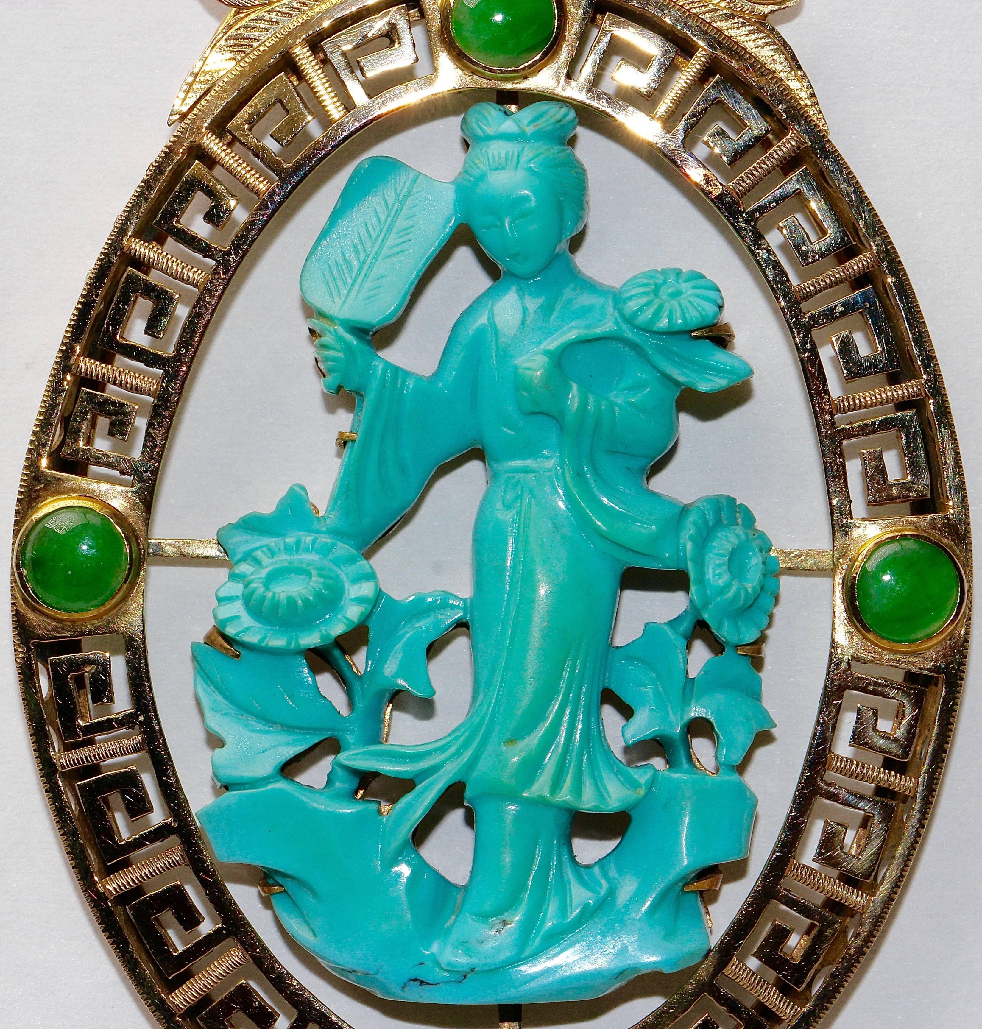 Beautiful, large pendant with fine turquoise carving. 14k yellow gold frame. Additionally set with four jade stones.

Length without eyelet approx. 75 mm.
Width about 45.5 mm.
