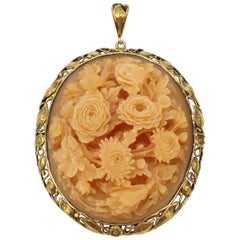 Large Chinese 14 Karat Gold and Carved Horn Floral Relief Pendant