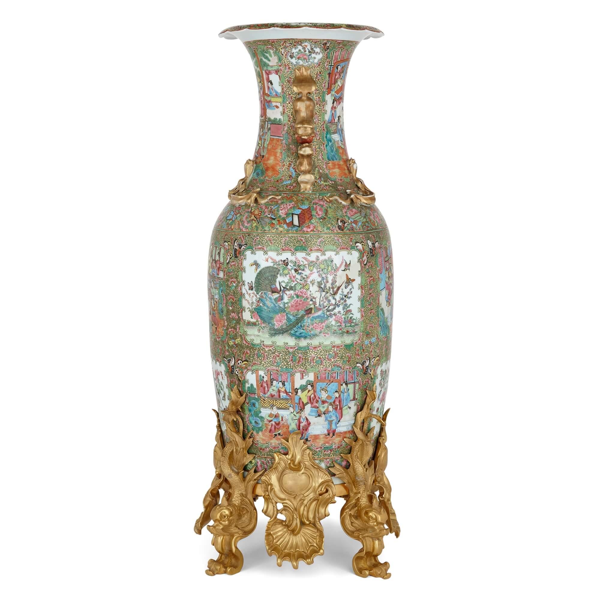 Large Chinese Canton famille verte ormolu mounted porcelain vase
Chinese, 19th Century
Height 107cm, diameter 37cm

This magnificent Chinese vase from Canton is decorated in the so-called famille verte manner, wherein the primary colour tones