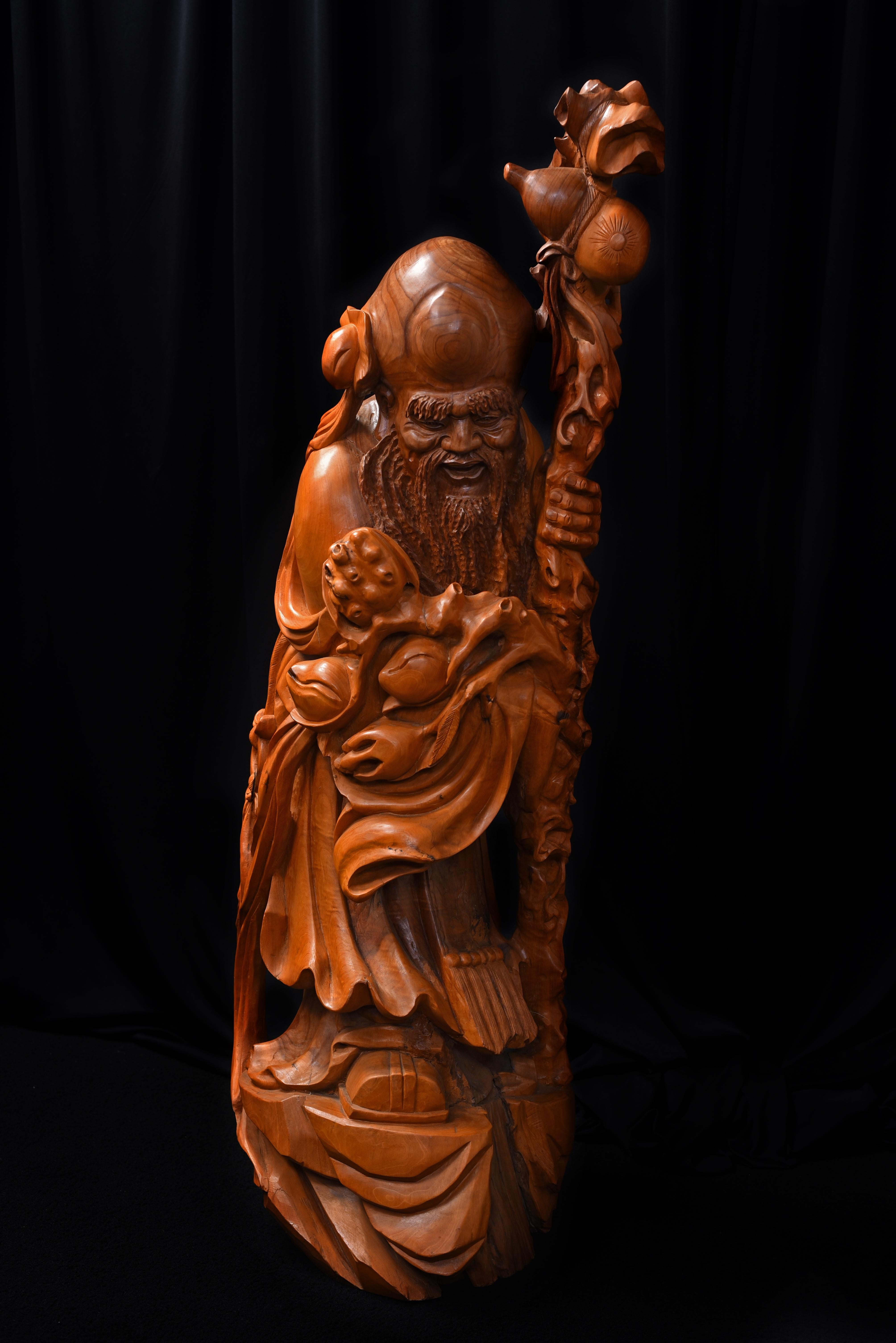 Stunning Chinese sculpture of Shou Xing God of Wisdom and Longevity.
Richly carved in organic burl wood.
circa 1960s.
Measure: 45.5
