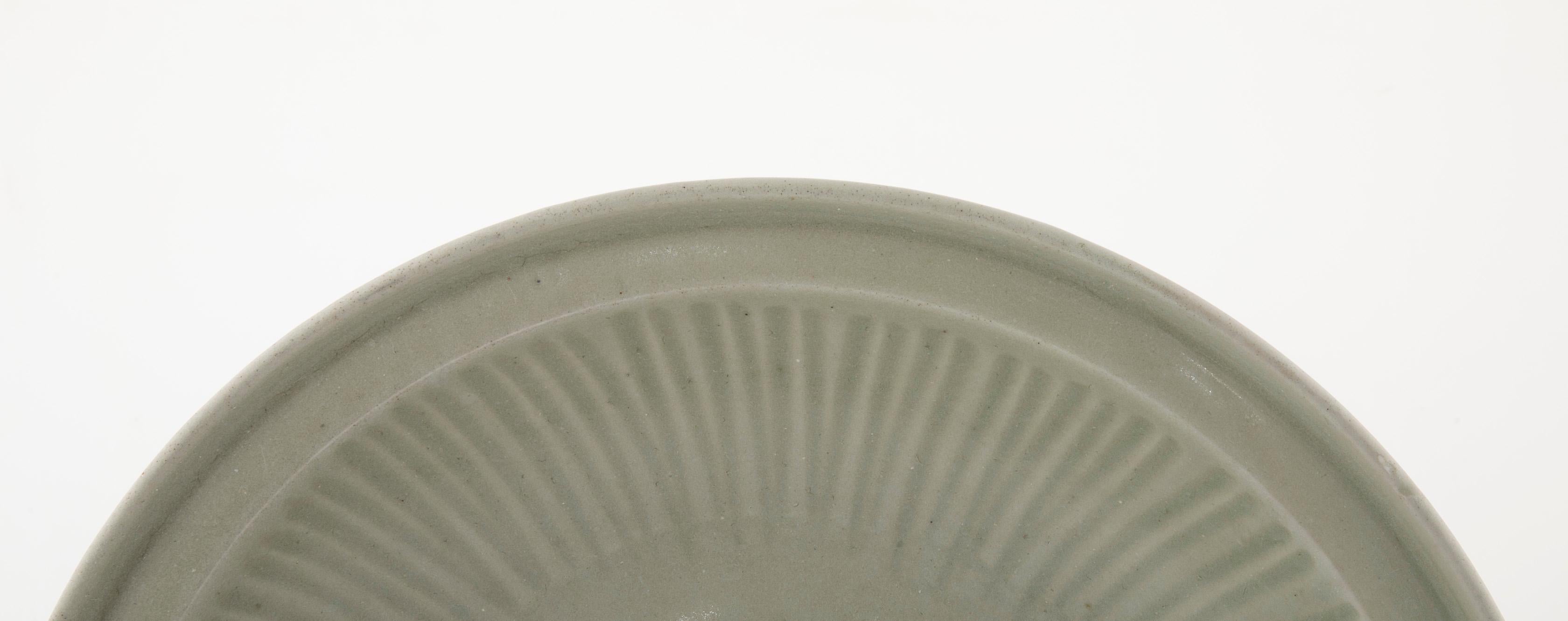 19th Century Large Chinese Celadon Shallow Bowl with Central Incised Peony Element For Sale