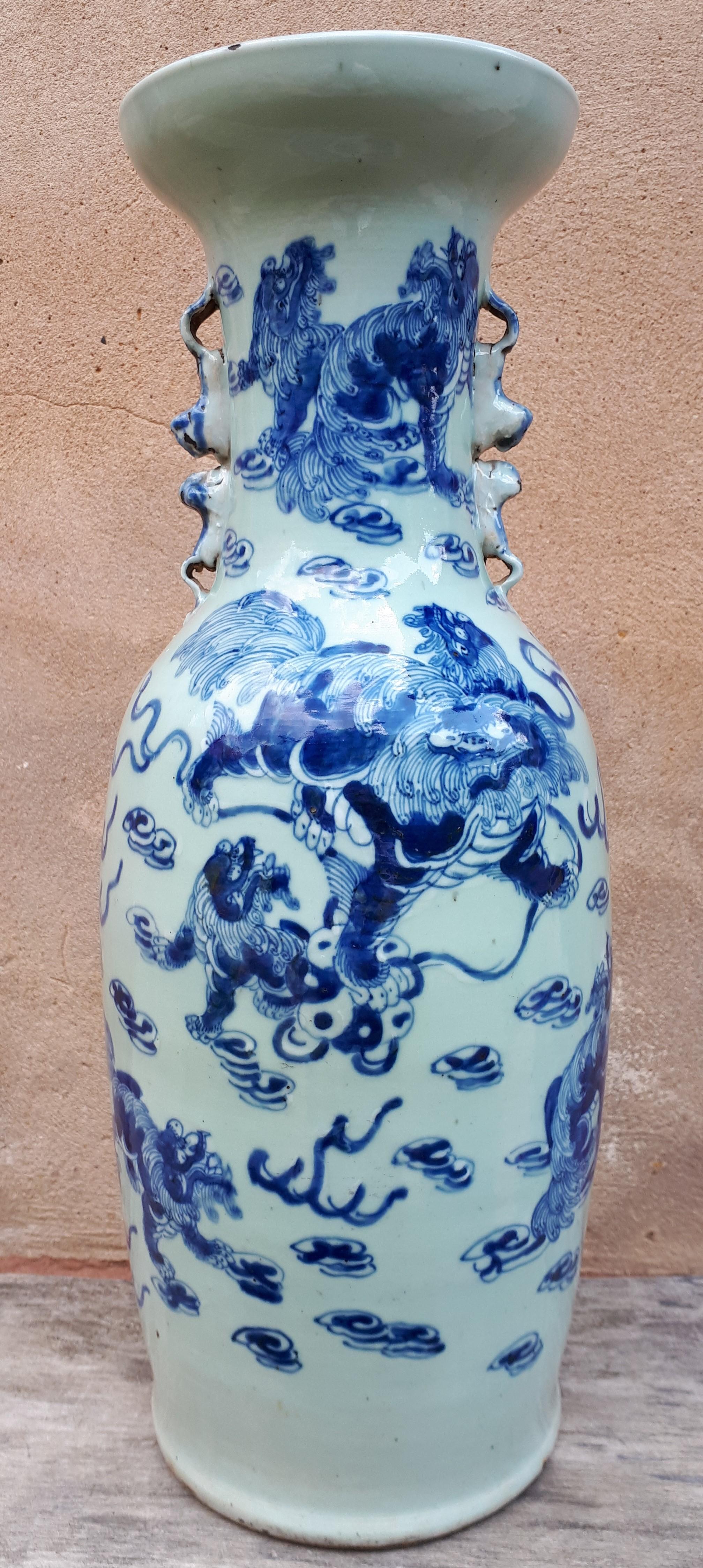 Large porcelain vase with blue decoration on a celadon ground of shishis among the clouds.
Height 58cm !
Two chips to the lip.
China, 19th century.