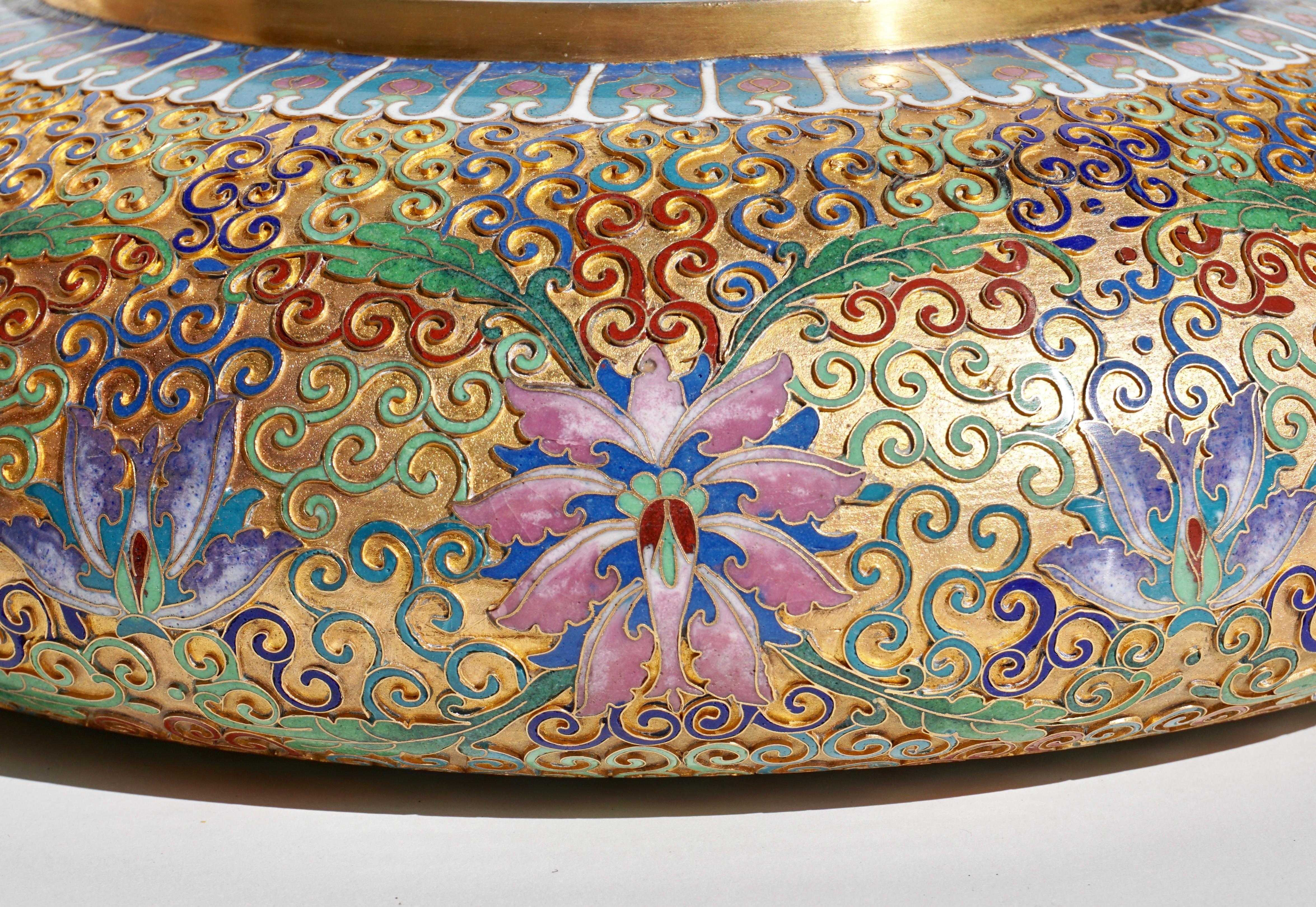 A Chinese cloisonné enamel alms bowl. With intricately detailed decoration. Interior decorated with chrysanthemums. A stunning and intricate piece of metalwork. Would make a wonderful centerpiece or planter.
20th century.

Measures: Height 4.5