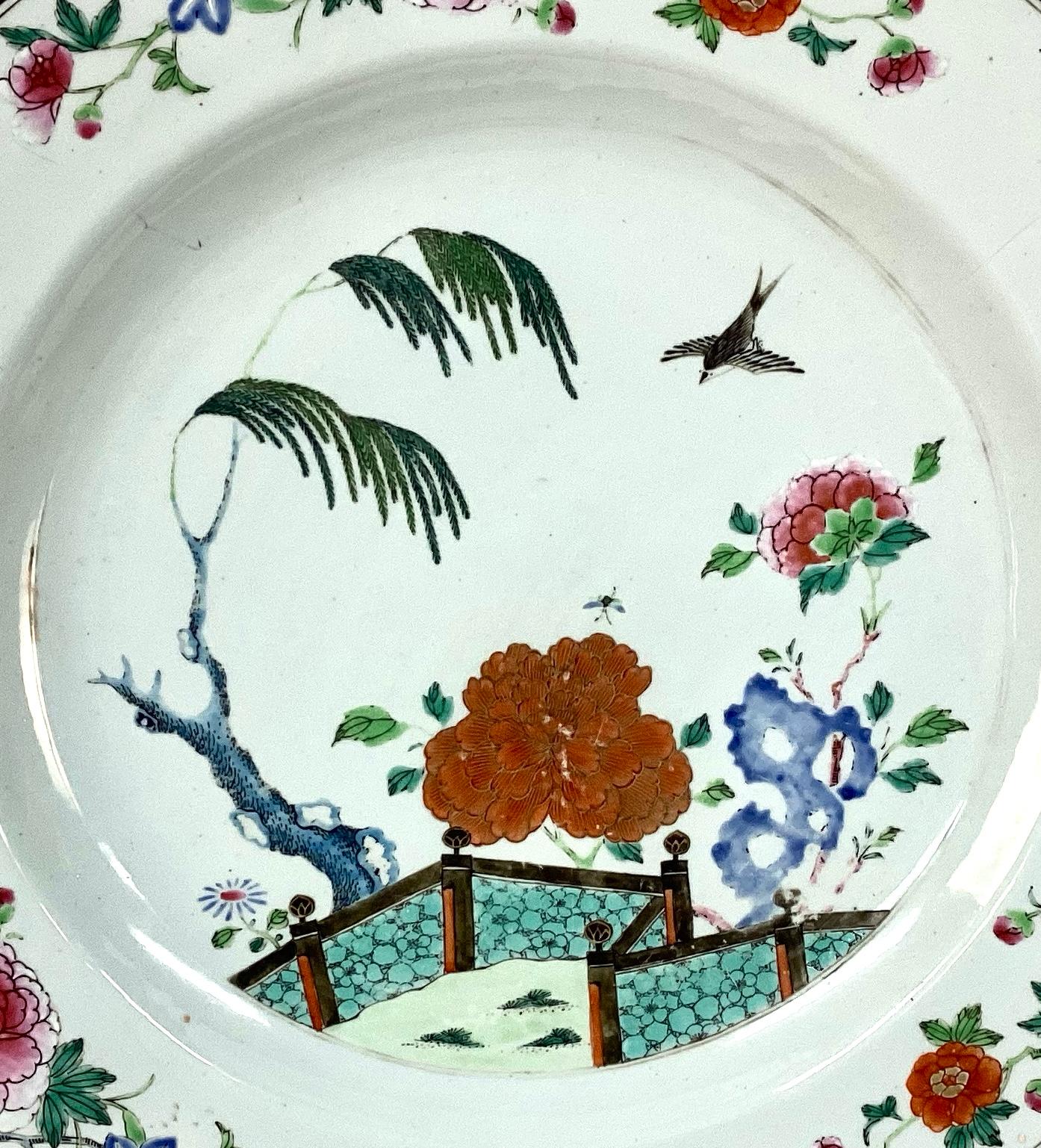 Large Chinese Export Qing Famille Rose Porcelain Platter. White porcelain with birds, flowers, trees and landscape in beautiful reds, pink, green and blue. Platter is very large and in excellent condition. There has been some written information on