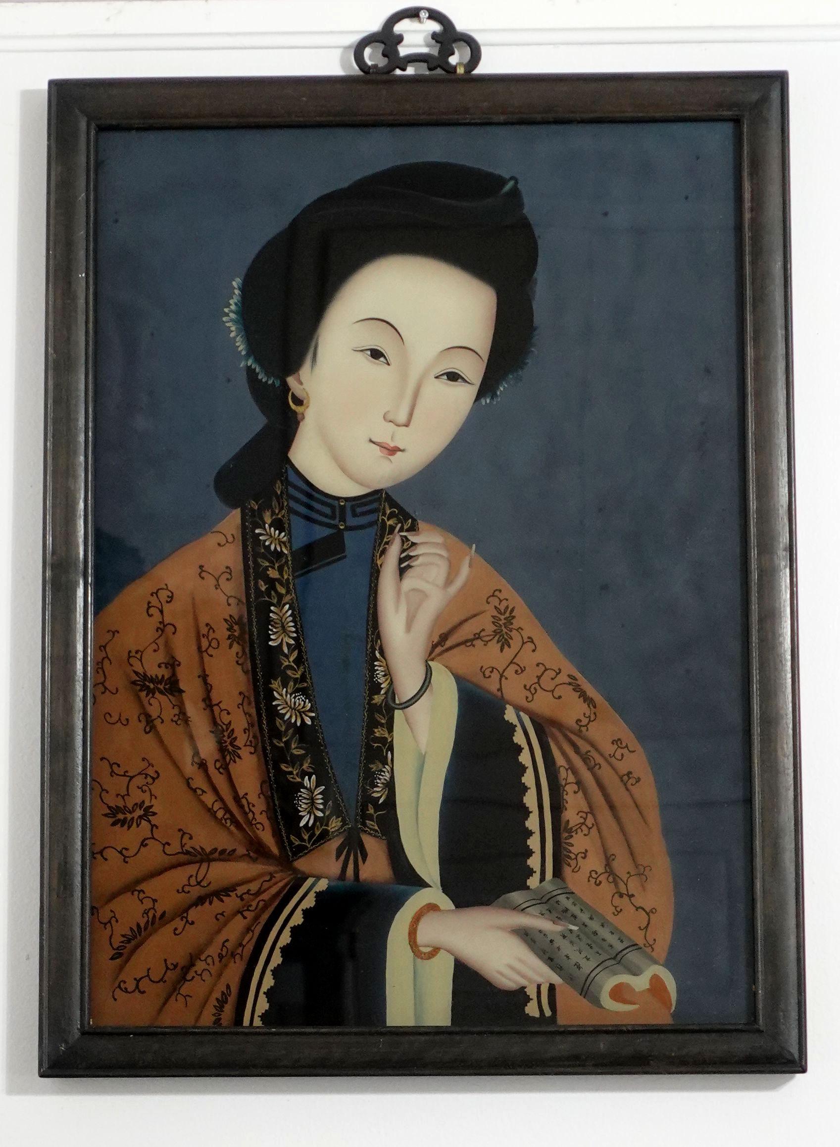 Large charming 19th-century Chinese export reverse glass painting, depicting the beauty of traditional Chinese customs and clothing decorations on the noblewomen. The paintings come with their original hardwood frame and the old pins in the back of