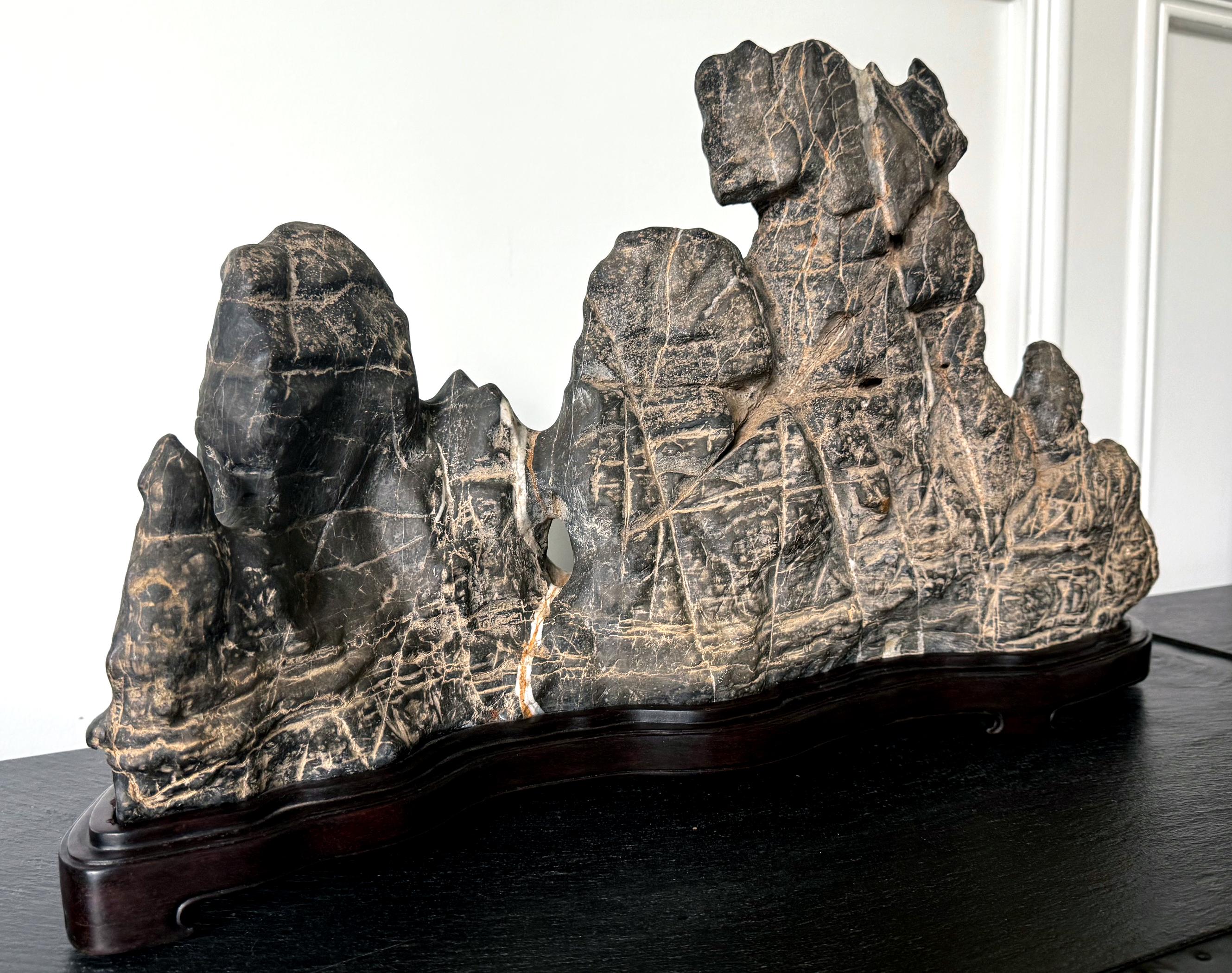 Large Chinese Horizontal Gray Lingbi Scholar Stone with Grotto on Display Stand For Sale 5