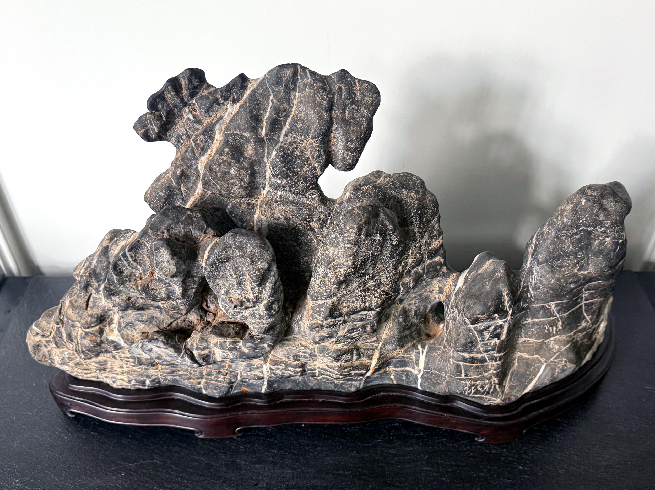 Large Chinese Horizontal Gray Lingbi Scholar Stone with Grotto on Display Stand For Sale 7