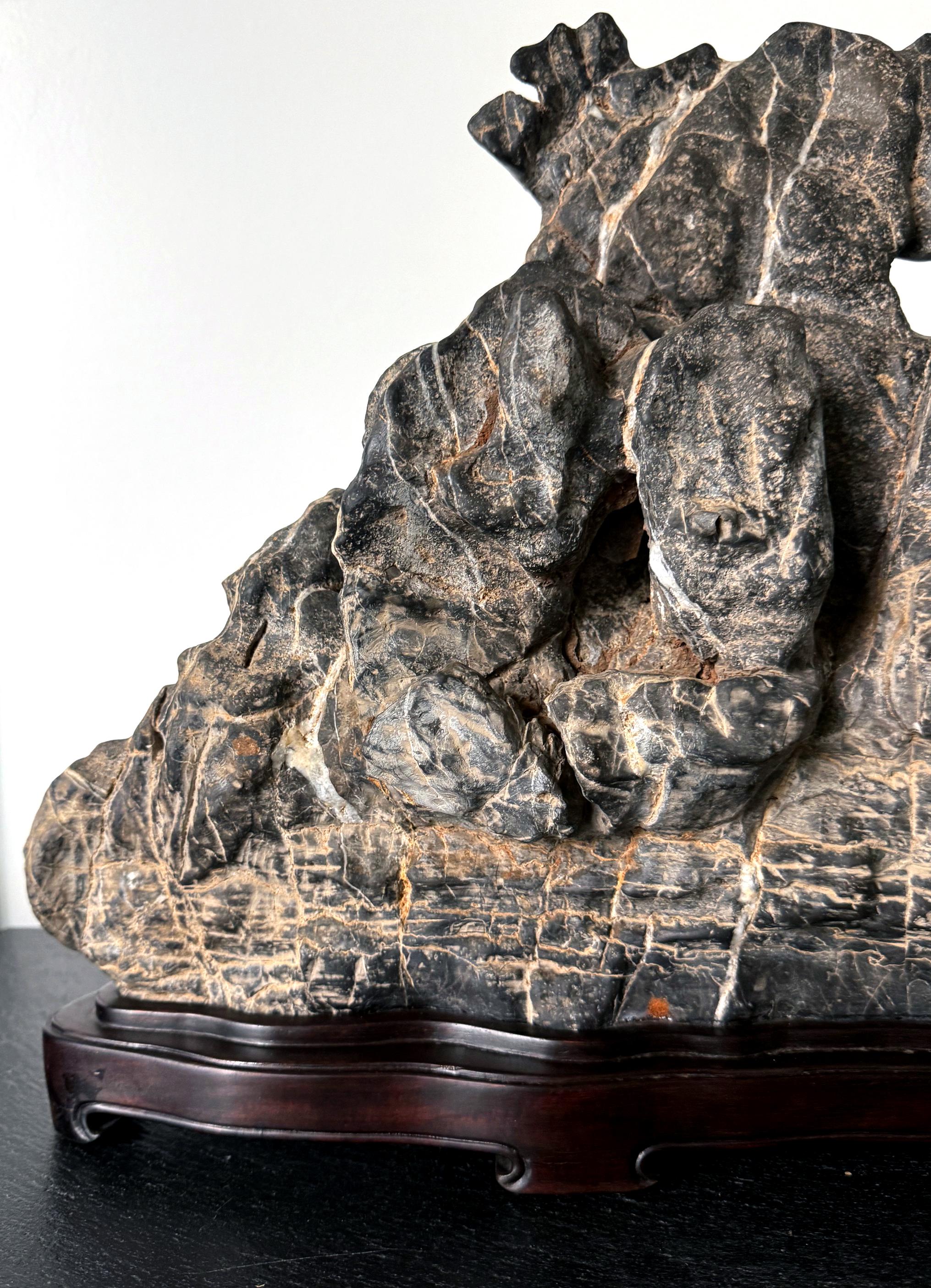 Large Chinese Horizontal Gray Lingbi Scholar Stone with Grotto on Display Stand For Sale 9