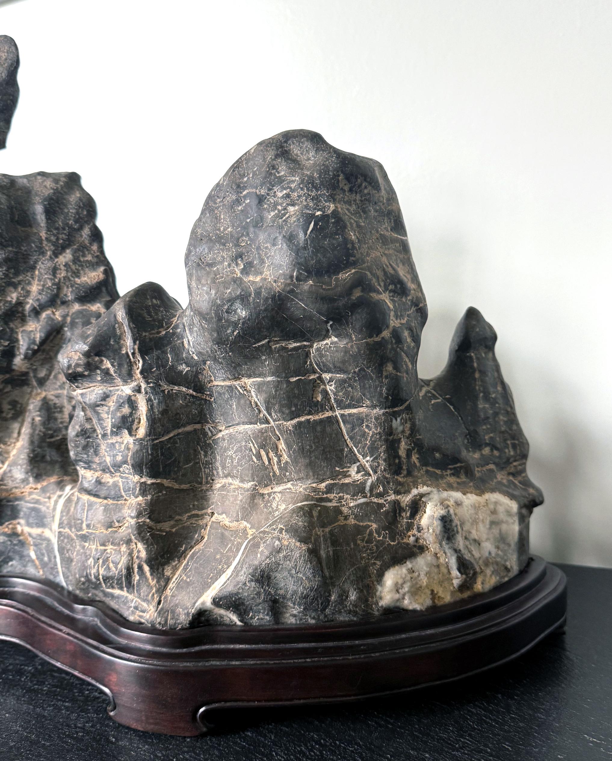 Large Chinese Horizontal Gray Lingbi Scholar Stone with Grotto on Display Stand For Sale 10