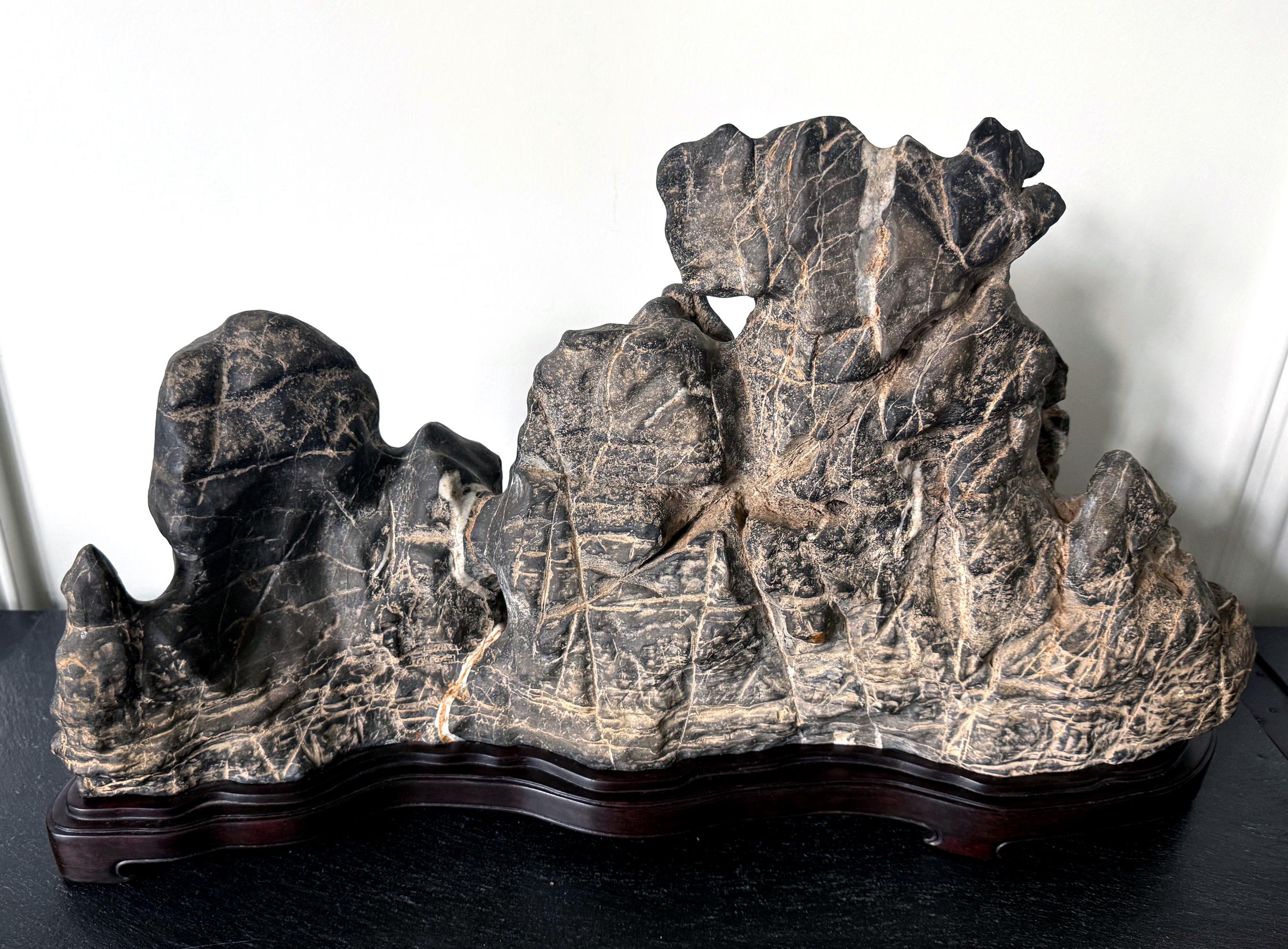 Qing Large Chinese Horizontal Gray Lingbi Scholar Stone with Grotto on Display Stand For Sale